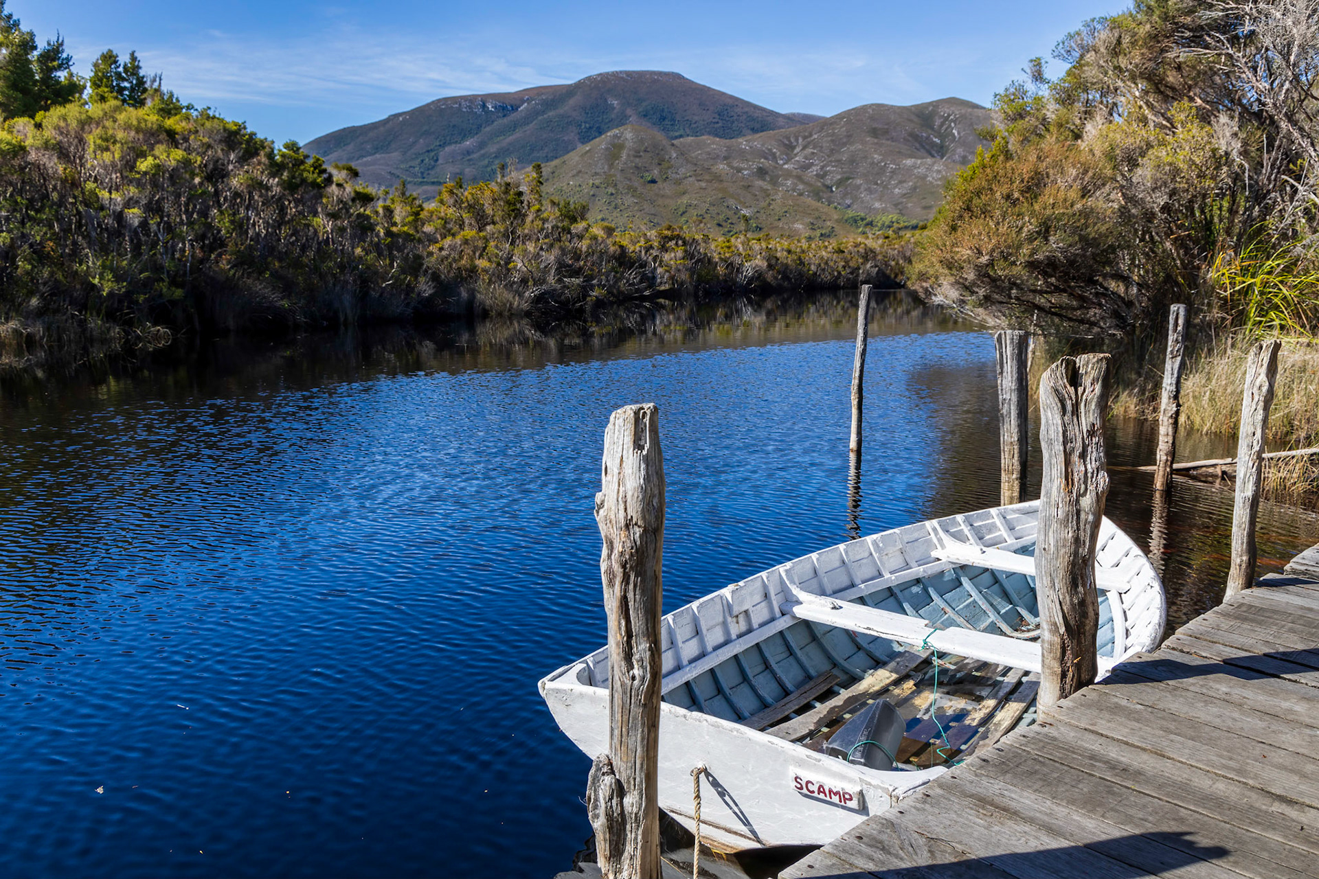 Port Davey pioneer Deny King. Boat &amp; landing.