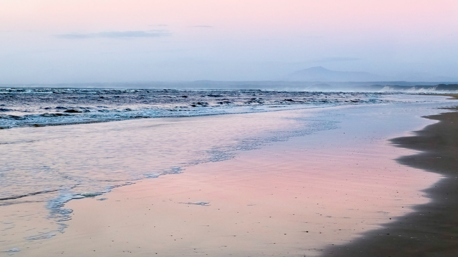 Ocean Beach (after sun down). Riding an ATV from Macquarie Head to the Ocean Beach car park near Strahan. With Strahan ATV Adventures