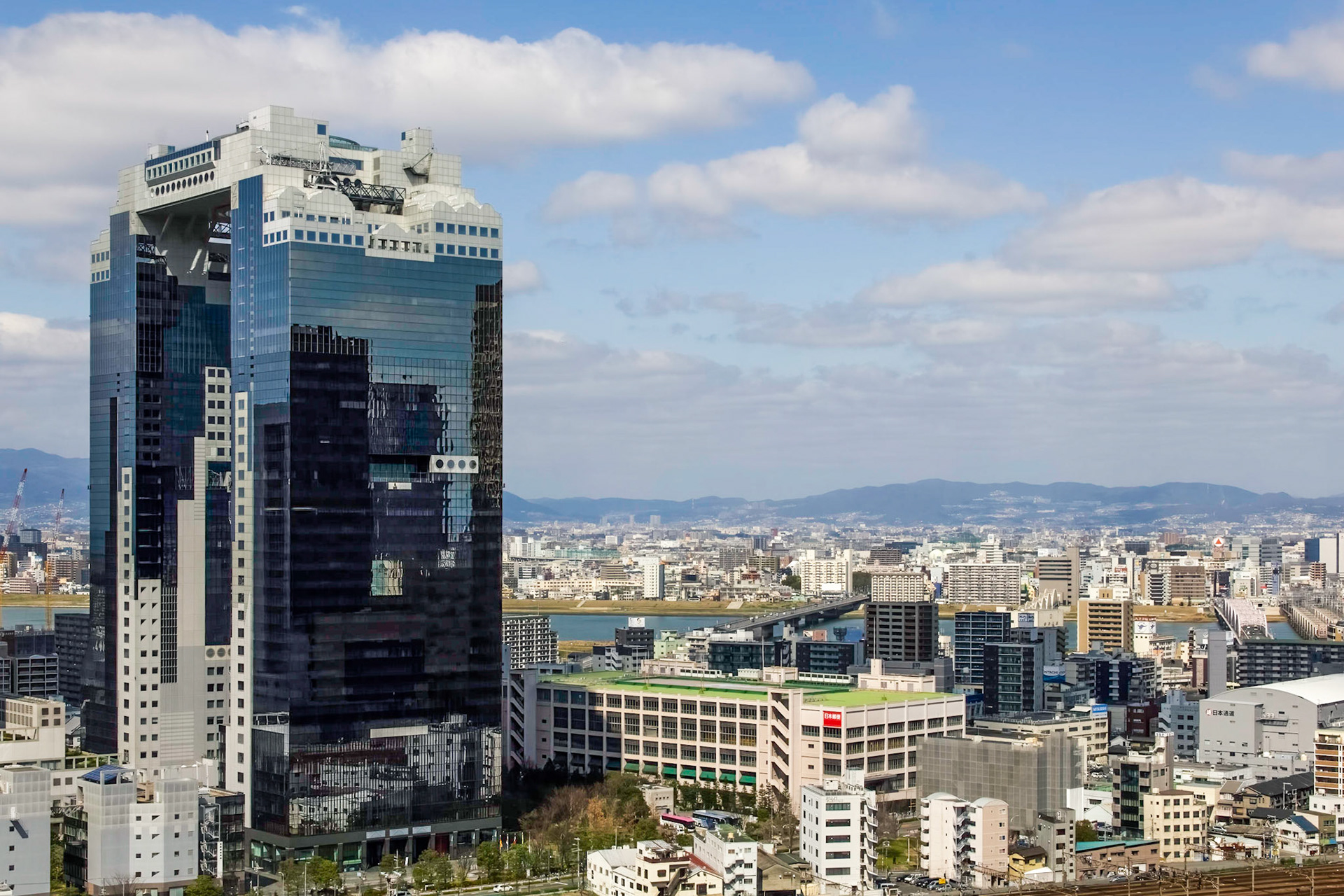 Umeda Sky Building and surrounds. Viewed from roof of the North Gate Building at Umeda Station.