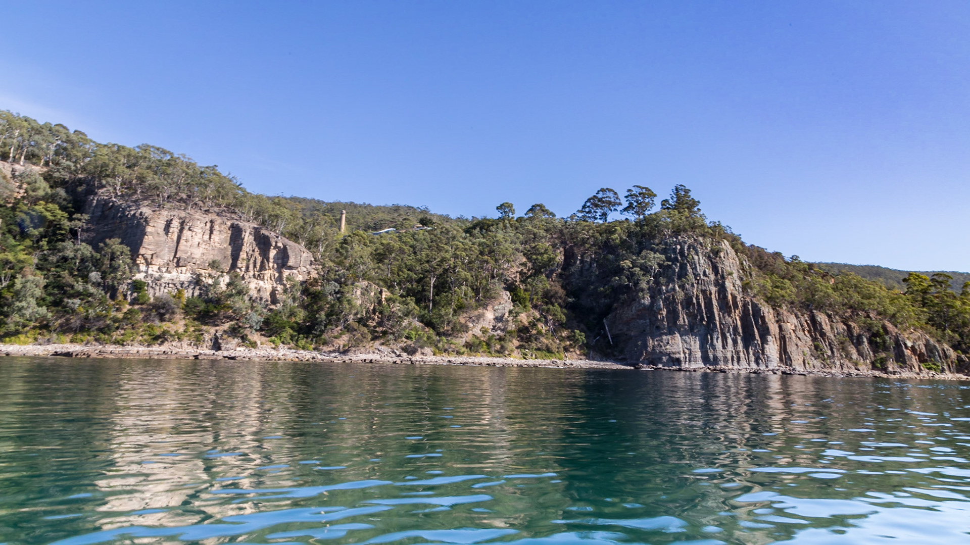 Shot Tower protruding from the forest behind the Alum Cliffs