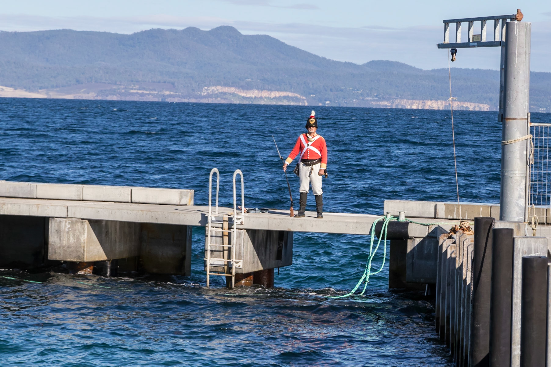 Convict-era British Soldier. Darlington jetty, with Prosser Bay and the Three Thumbs hills in the background
