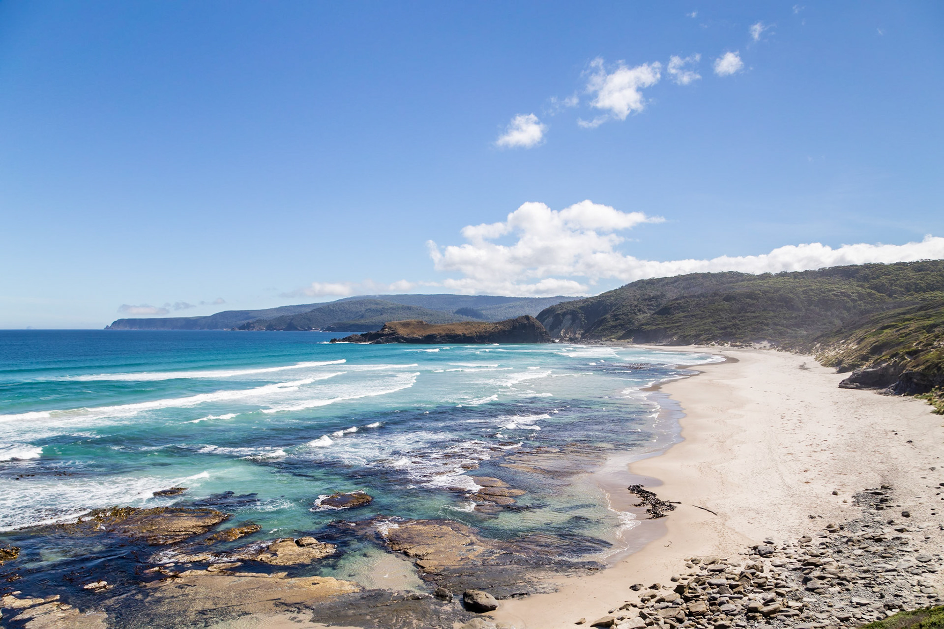 At South Cape Bay: view to Lion Rock and beyond to South Cape.
