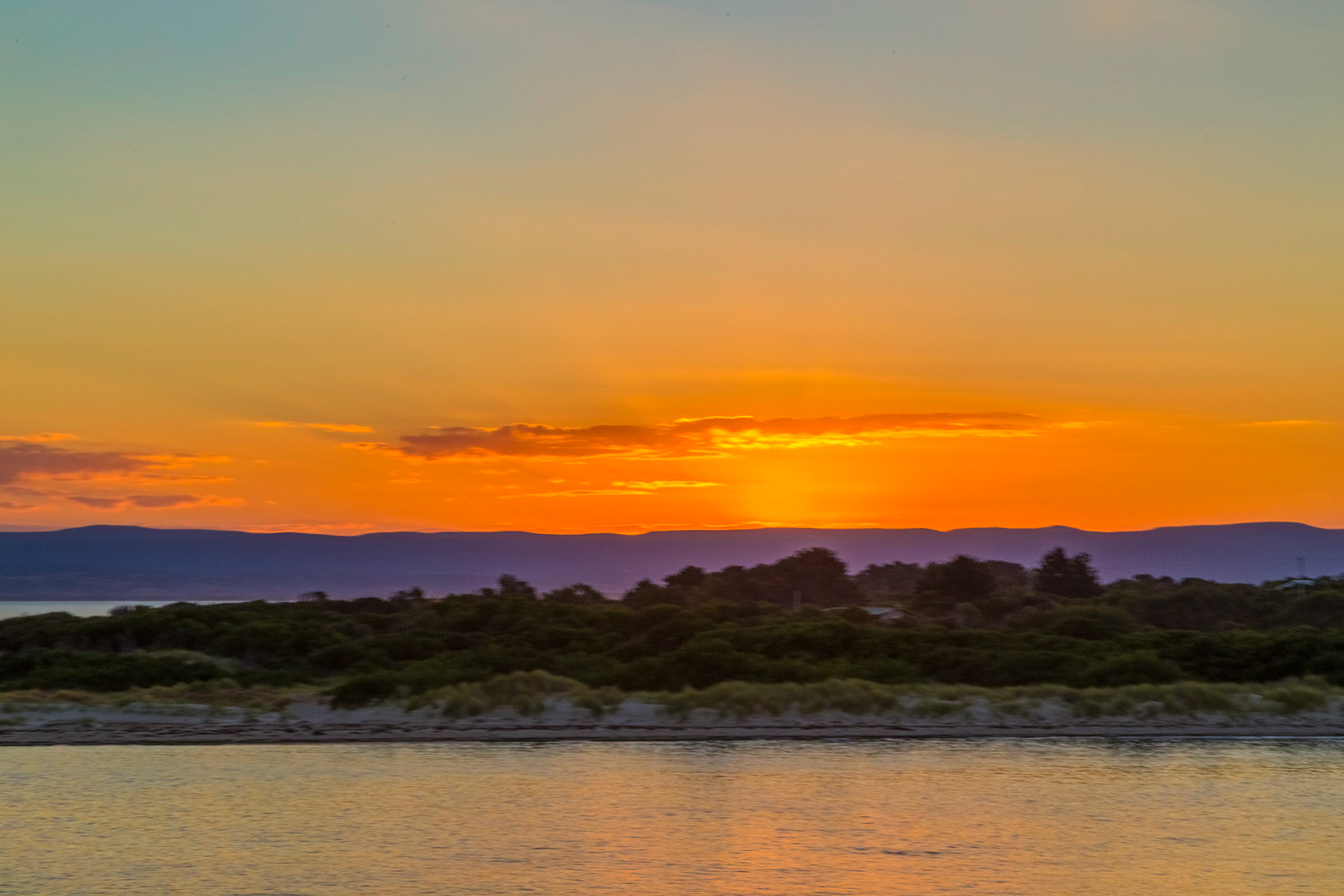 Coles Bay. Sunset across Great Oyster Bay, from Sandpiper Beach