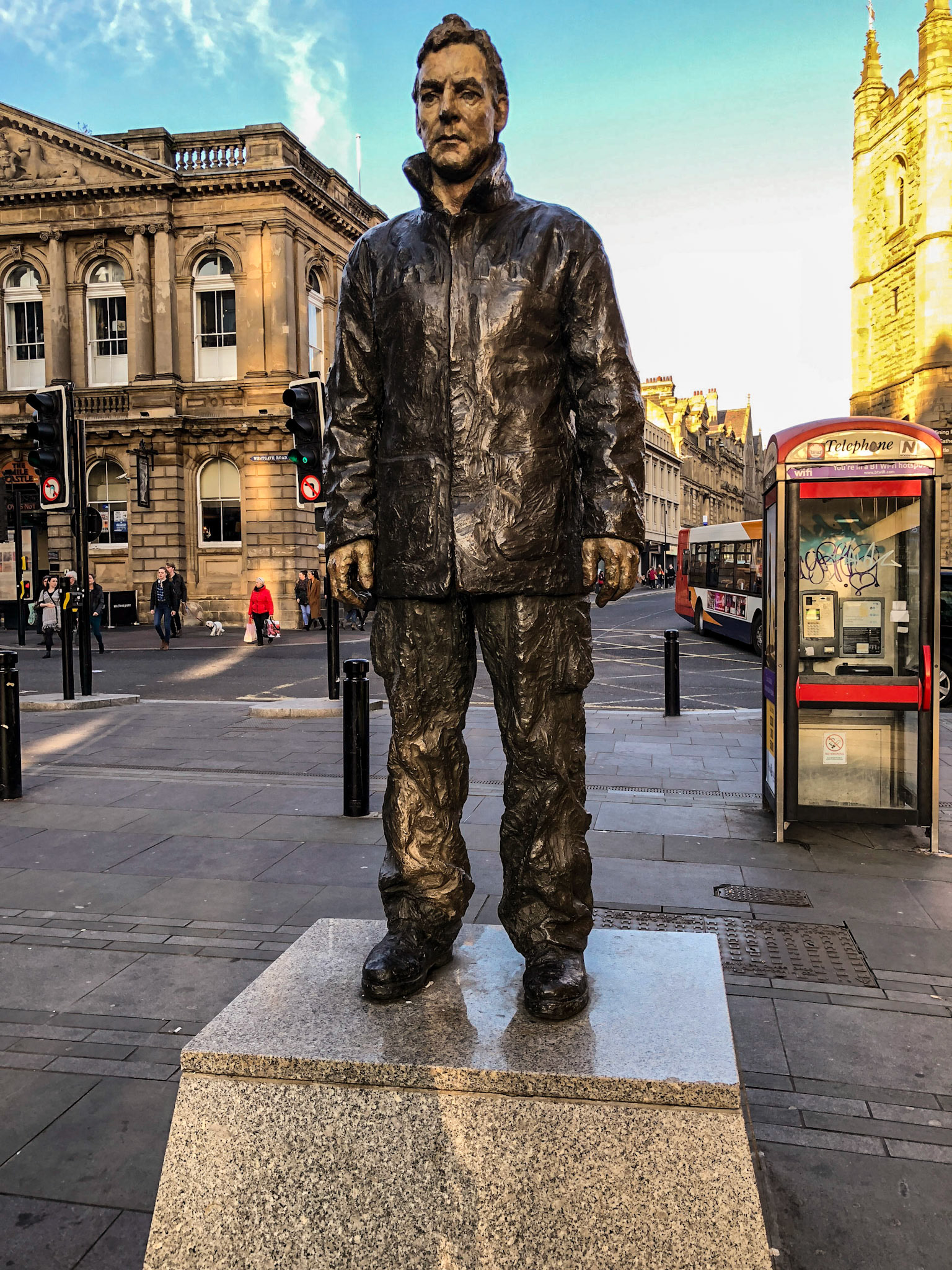 Standing Man. Man with Potential Selves is a piece of public art in the city of Newcastle upon Tyne consisting of three statues, dubbed by sculptor Sean Henry as Standing Man, Walking Man and Floating Man. They are meant to represent three aspects or alter egos of the same man, based on no-one in particular, rather symbolising an Everyman character, or the working men of the city.