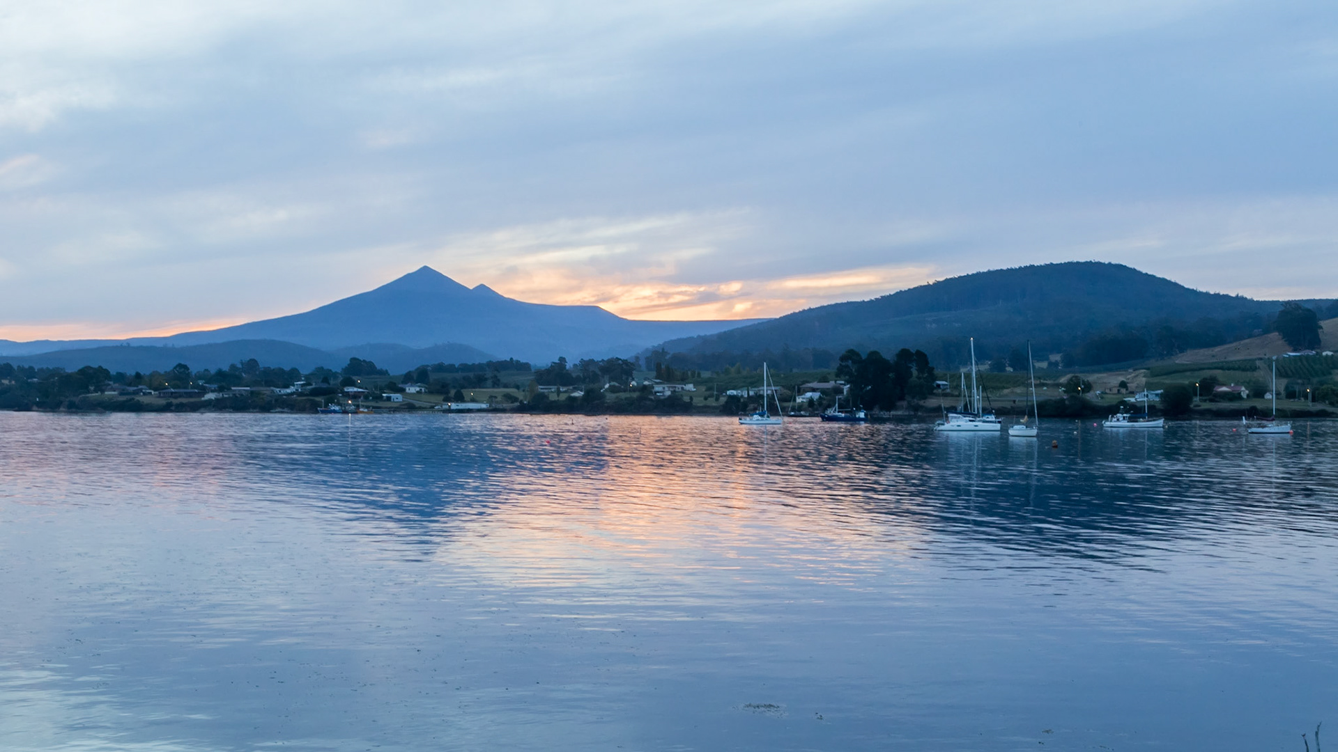 Dover Bay with the sunset behind Adamsons Peak