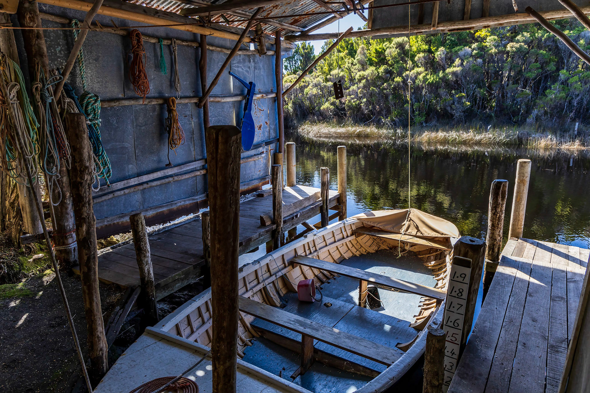 Port Davey pioneer Deny King. Boatshed.
