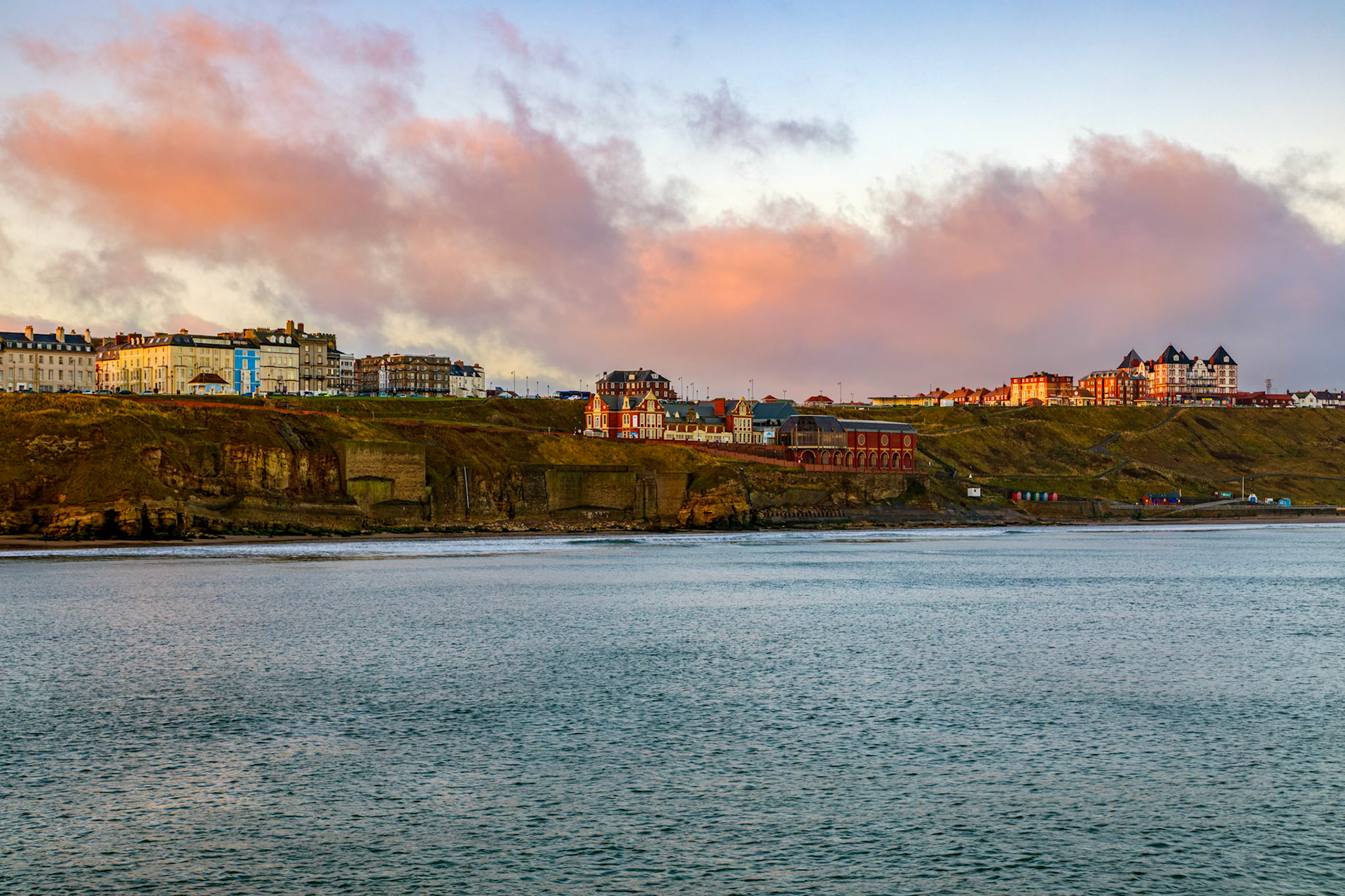 Sunrise light catching the buildings on the West Cliff of Whitby