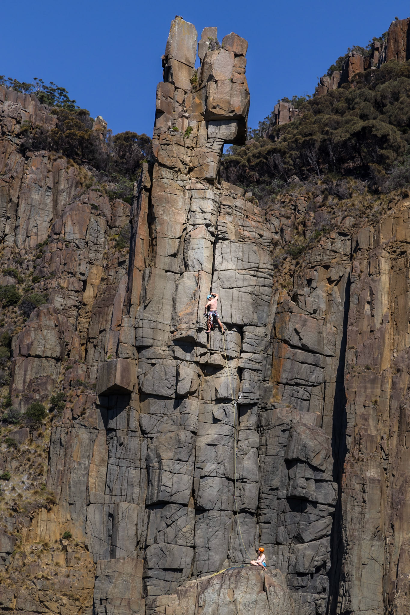 A Rock Climber on ' The Monument',  South Bruny National Park.