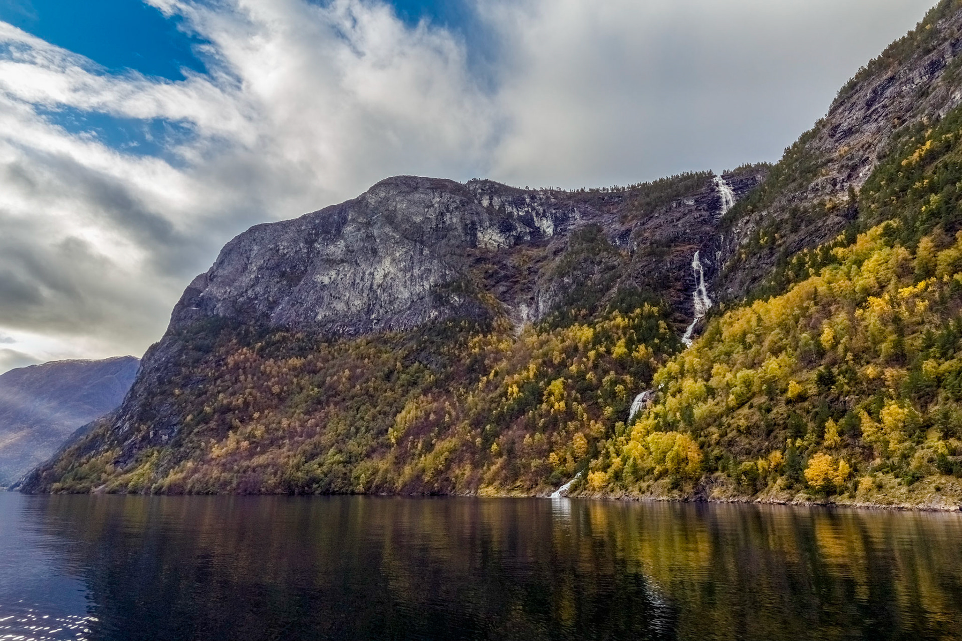 Passing through the Nærøyfjord. Passing through the Nærøyfjord. On the 'Vision of the Fjords' boat from Flåm to Gudvangen, late afternoon.