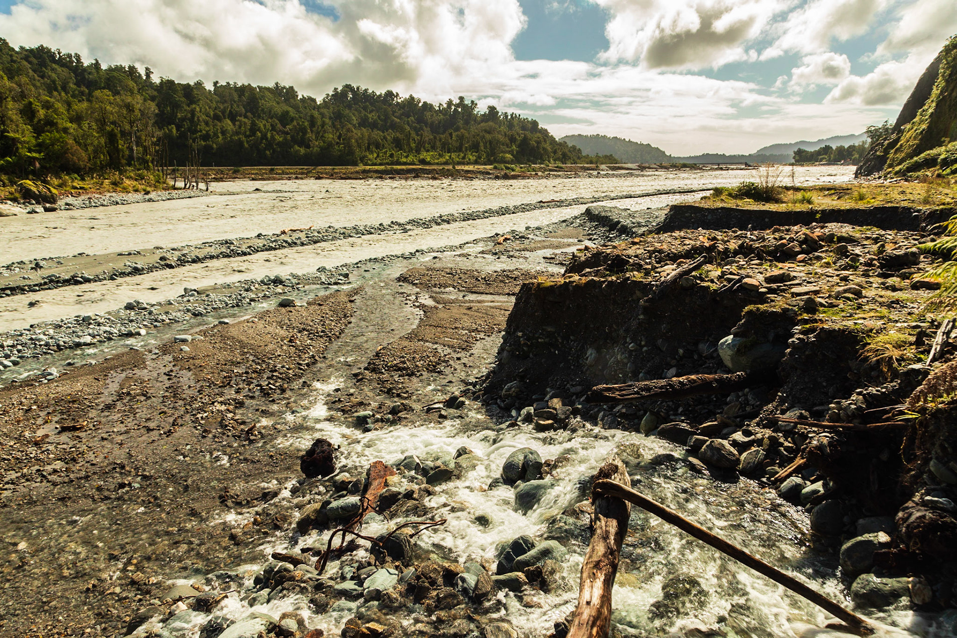 Callery River towards the confluence with the Waiho River, which washed away the highway bridge the previous day 