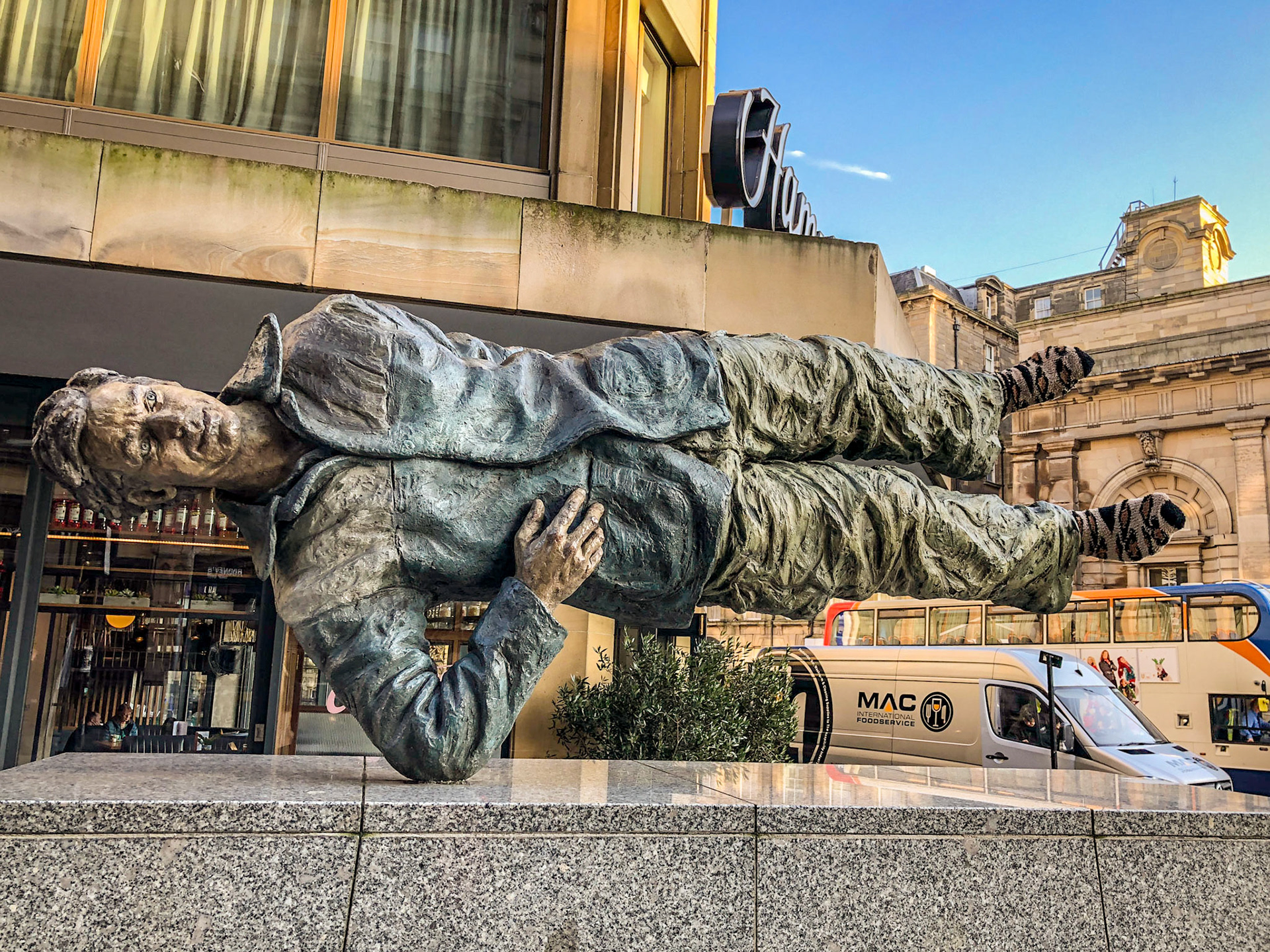 Floating Man. Man with Potential Selves is a piece of public art in the city of Newcastle upon Tyne consisting of three statues, dubbed by sculptor Sean Henry as Standing Man, Walking Man and Floating Man. They are meant to represent three aspects or alter egos of the same man, based on no-one in particular, rather symbolising an Everyman character, or the working men of the city.