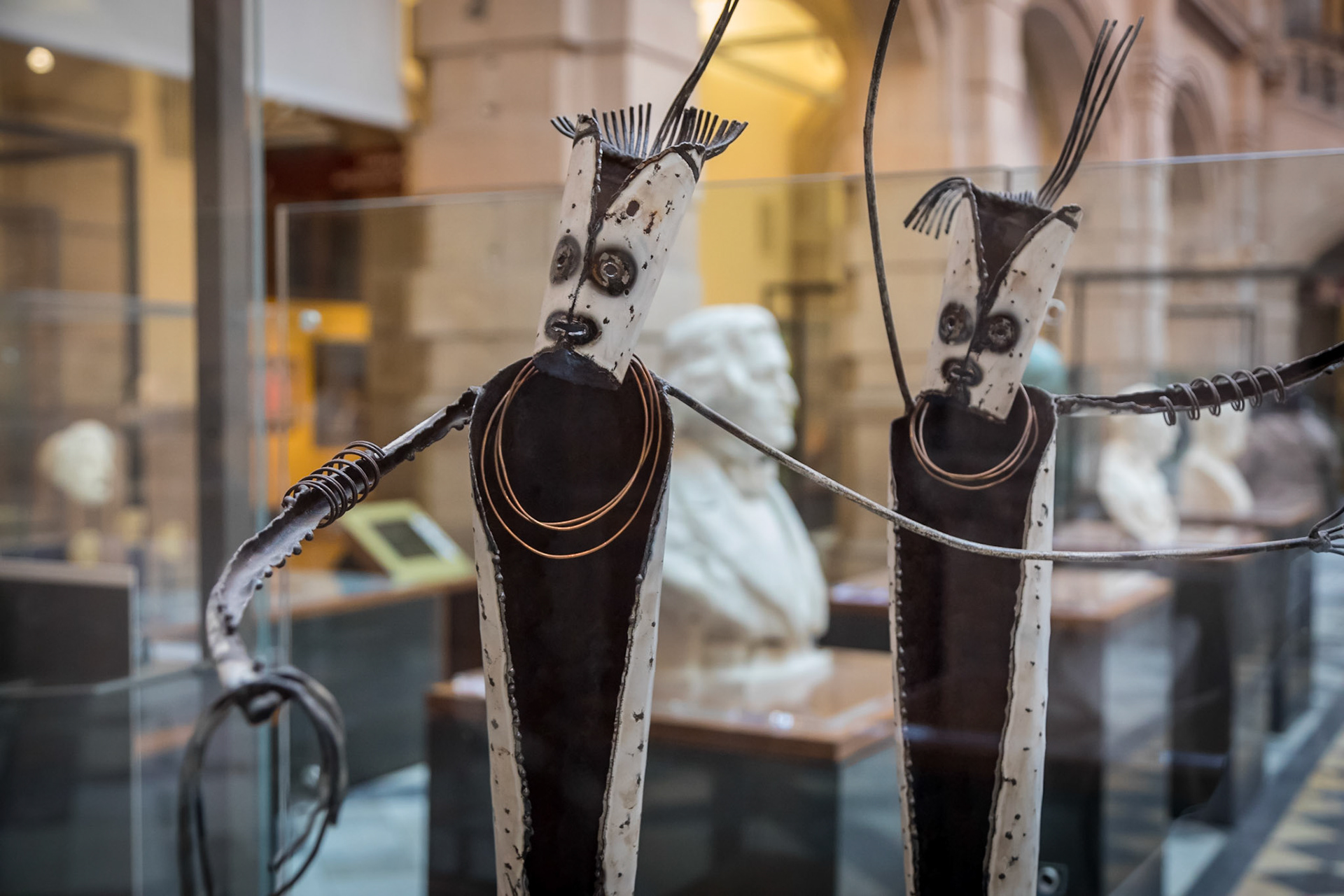 Manus Singsing II. Figures by artist Tom Deko that he say represent dancers from Manus Island in PNG. In the Kelvingrove Art Gallery & Museum