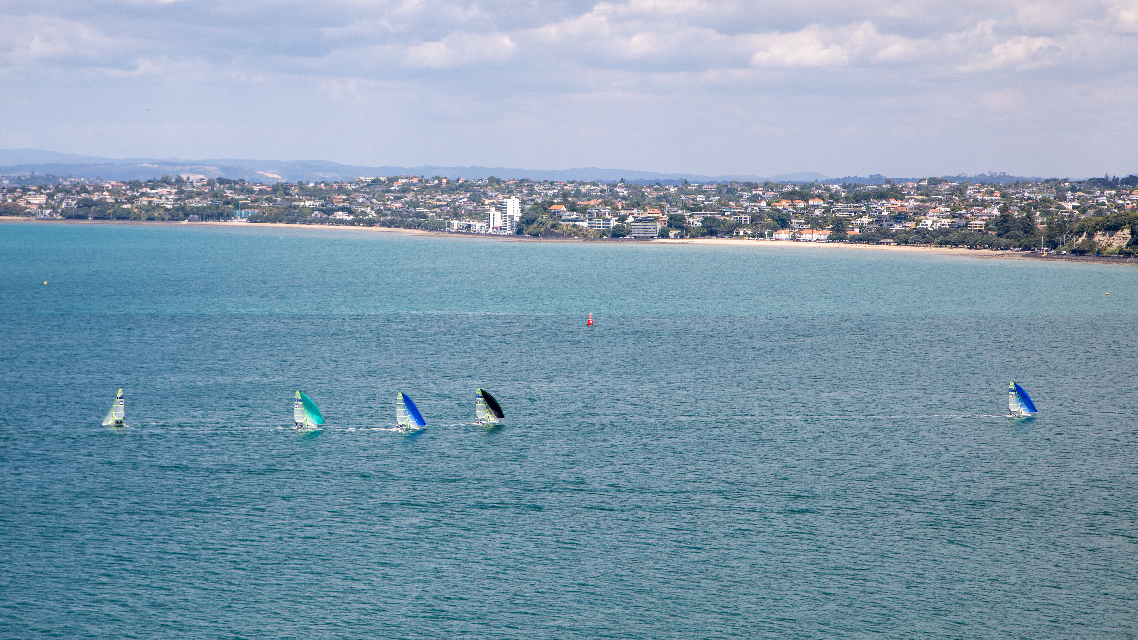 Sail boats racing on Torpedo Bay