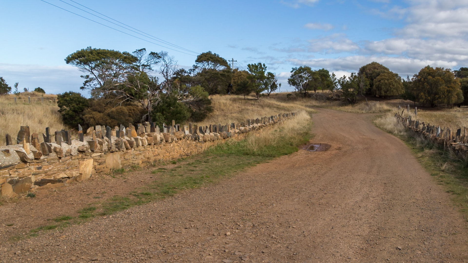 Road across Spiky Bridge (1840s) is part of the old convict-built coach road that connected Swansea with Little Swanport and the east coast road to Hobart