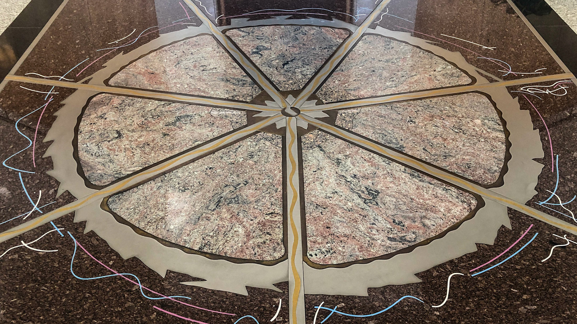 NT Floral Emblem, in the Parliament House Foyer. (by artist Geoff Todd; stone &amp; metal).