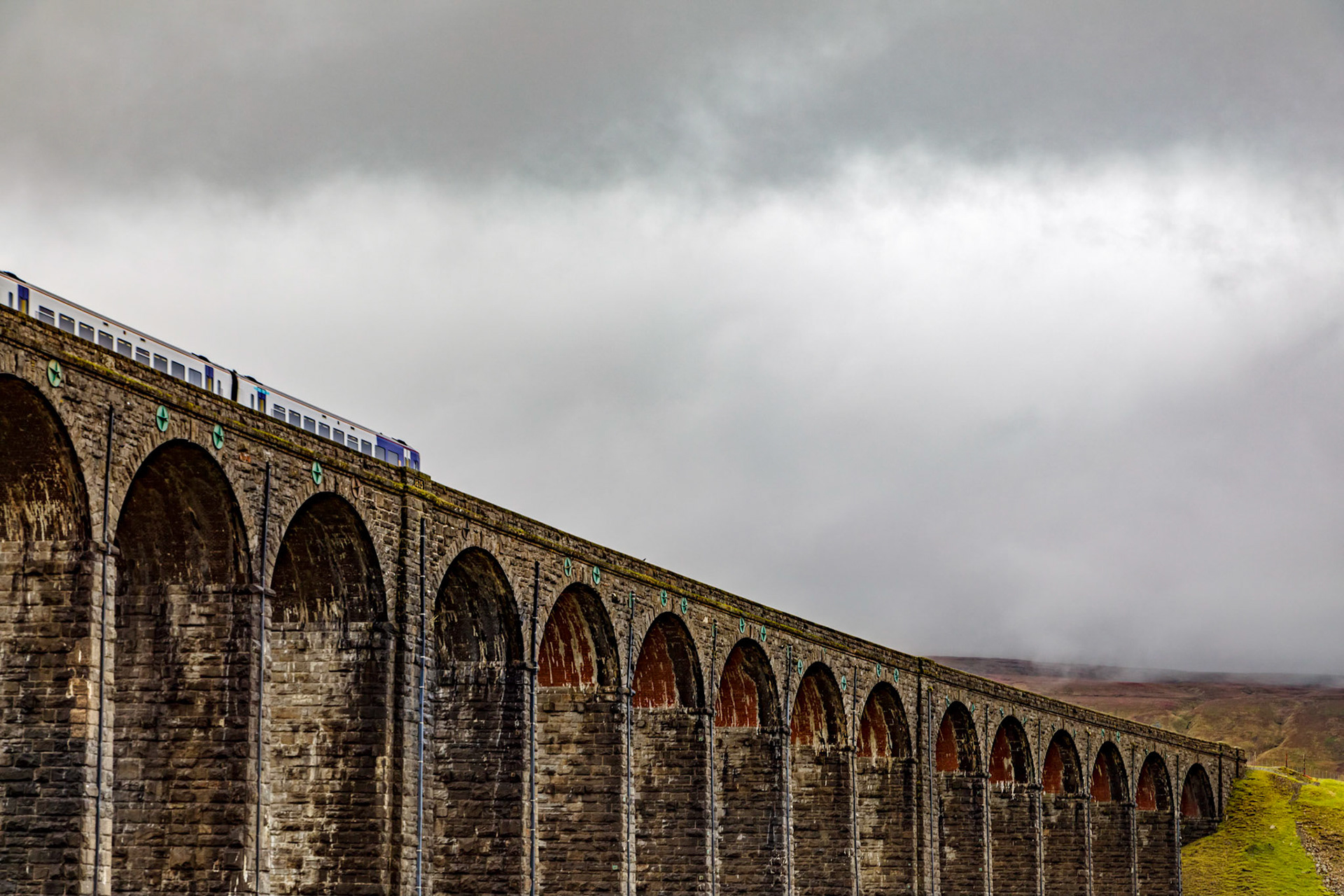 A train crossing over the Ribblehead Viaduct, North Yorkshire Dales