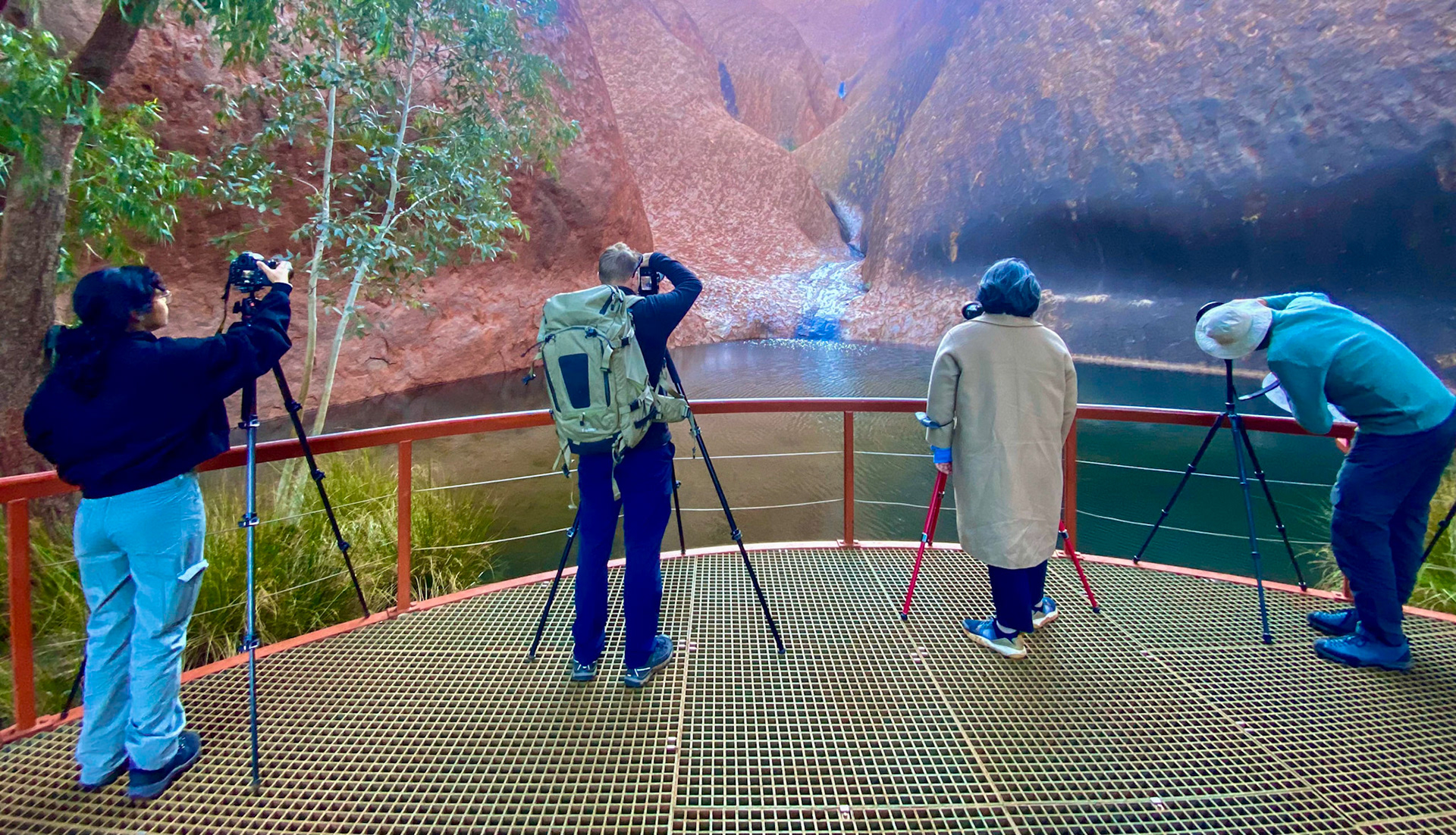 Some MG Photo group members at the Mutitjulu Waterhole, Uluru