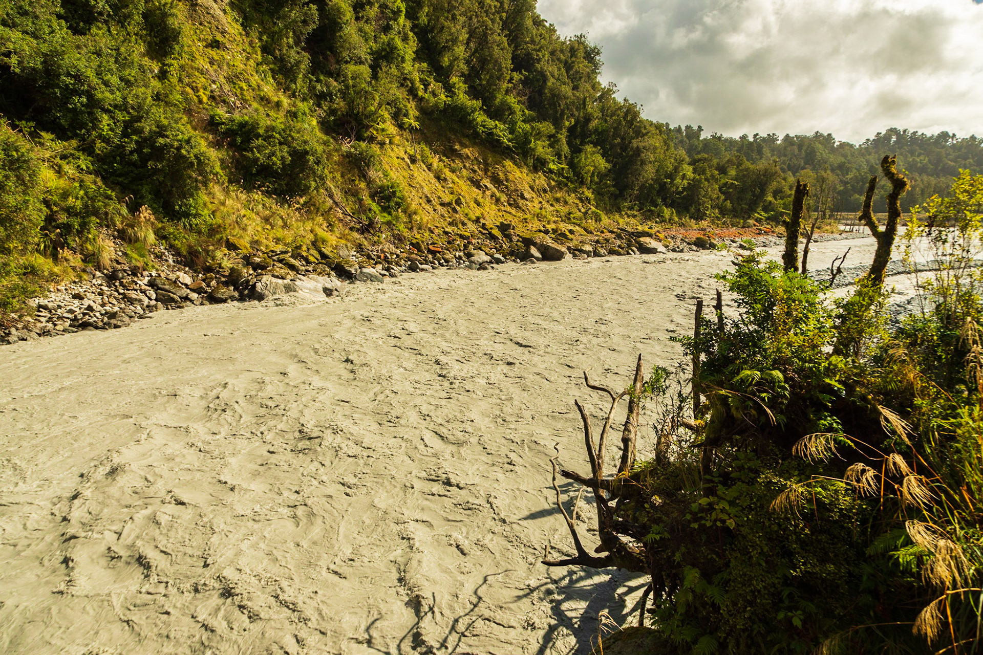 Milky-grey waters of the Callery River spilling out from Callery Gorge