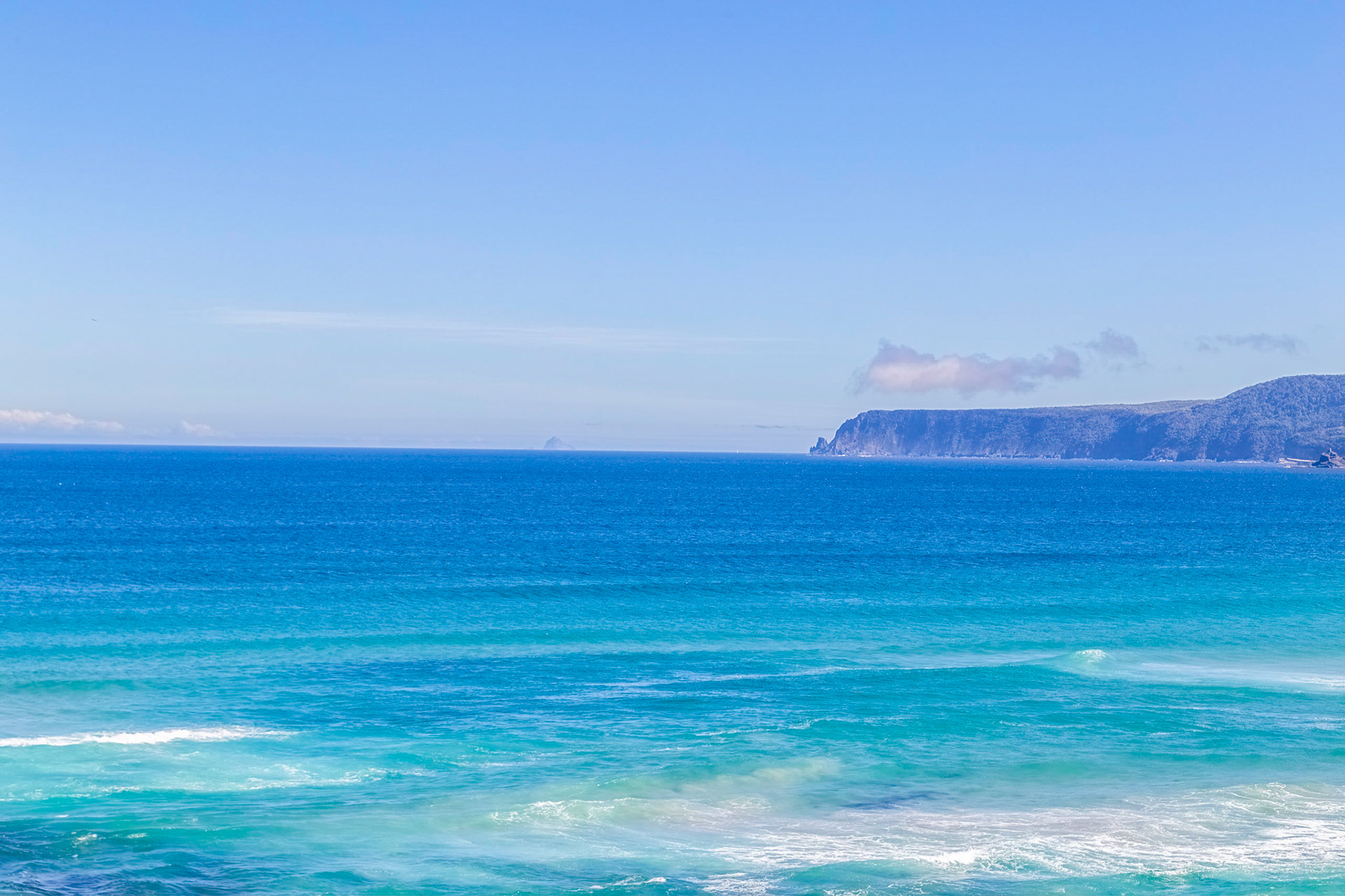 At South Cape Bay: view around to South Cape, one of the most southerly locations of the Tasmanian mainland.