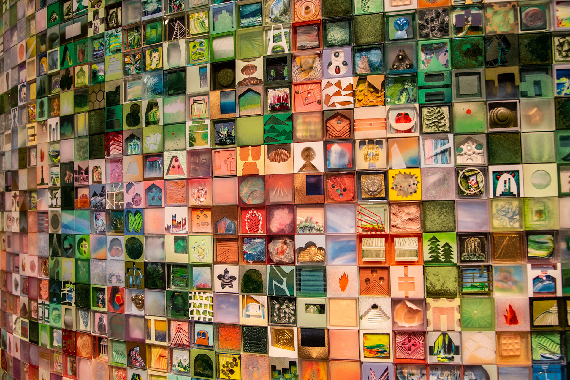 10,000 tiny drawings, paintings, and relief sculptures intended to inspire our thoughts about a perfect world.