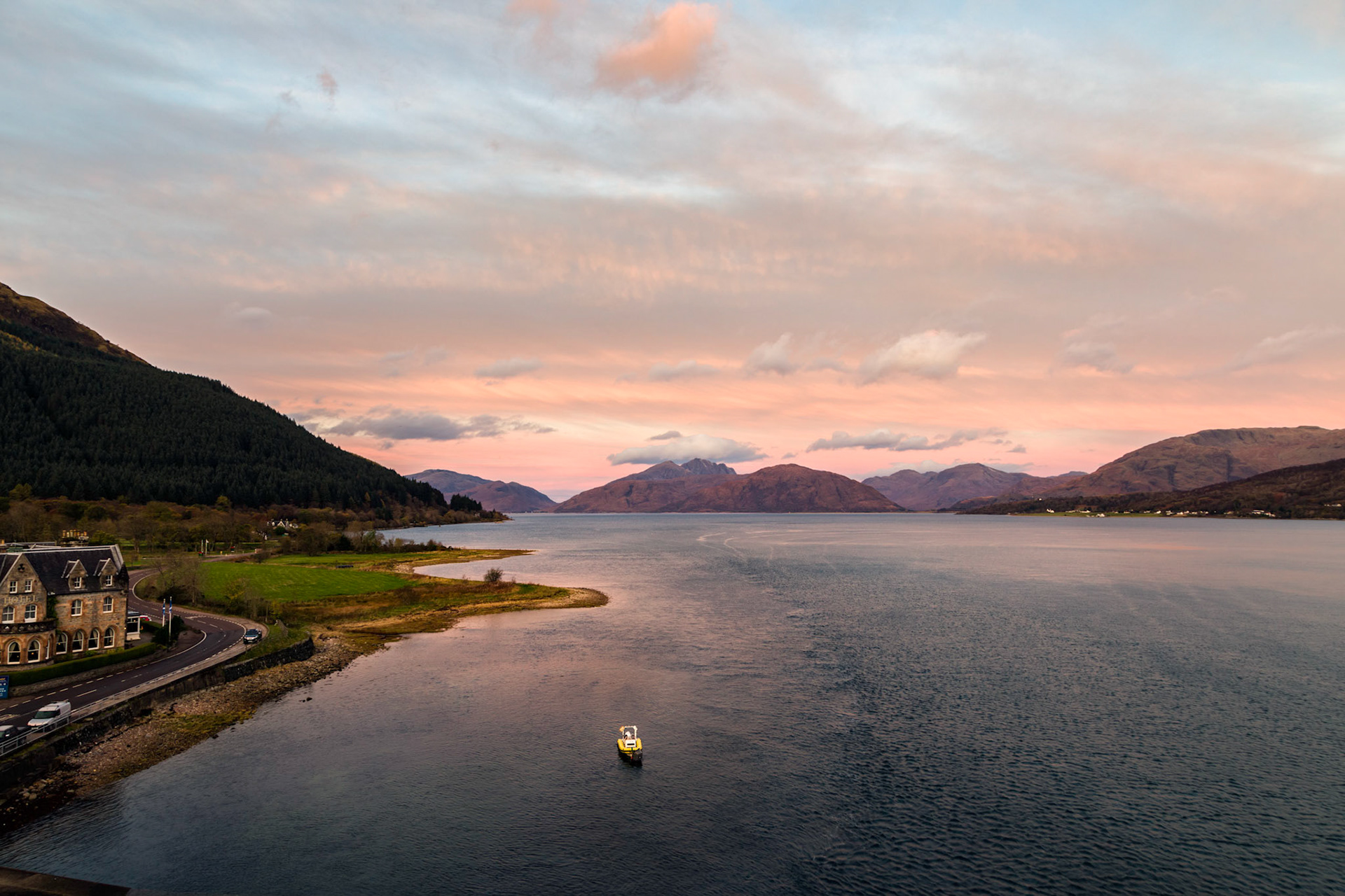 Ballachulish Hotel on the edgre of Loch Linnhe. Early morning view to the west from the Ballachulish Bridge