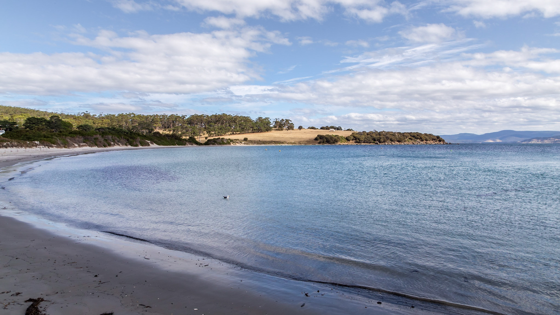 Darlington Bay, Maria Island. Ruby Hunts historic cottage across the bay.