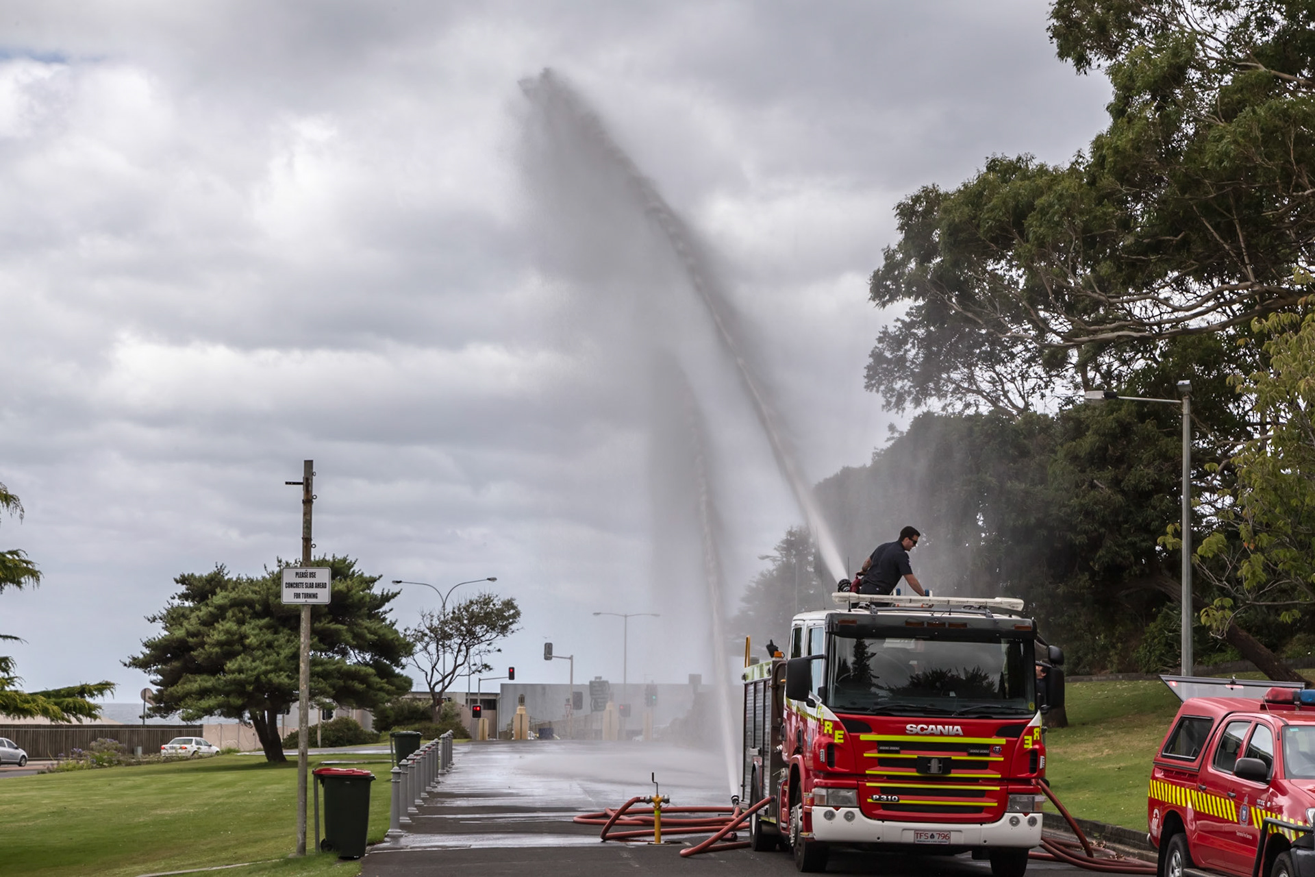 Firemen practising hose work. In Burnie Park