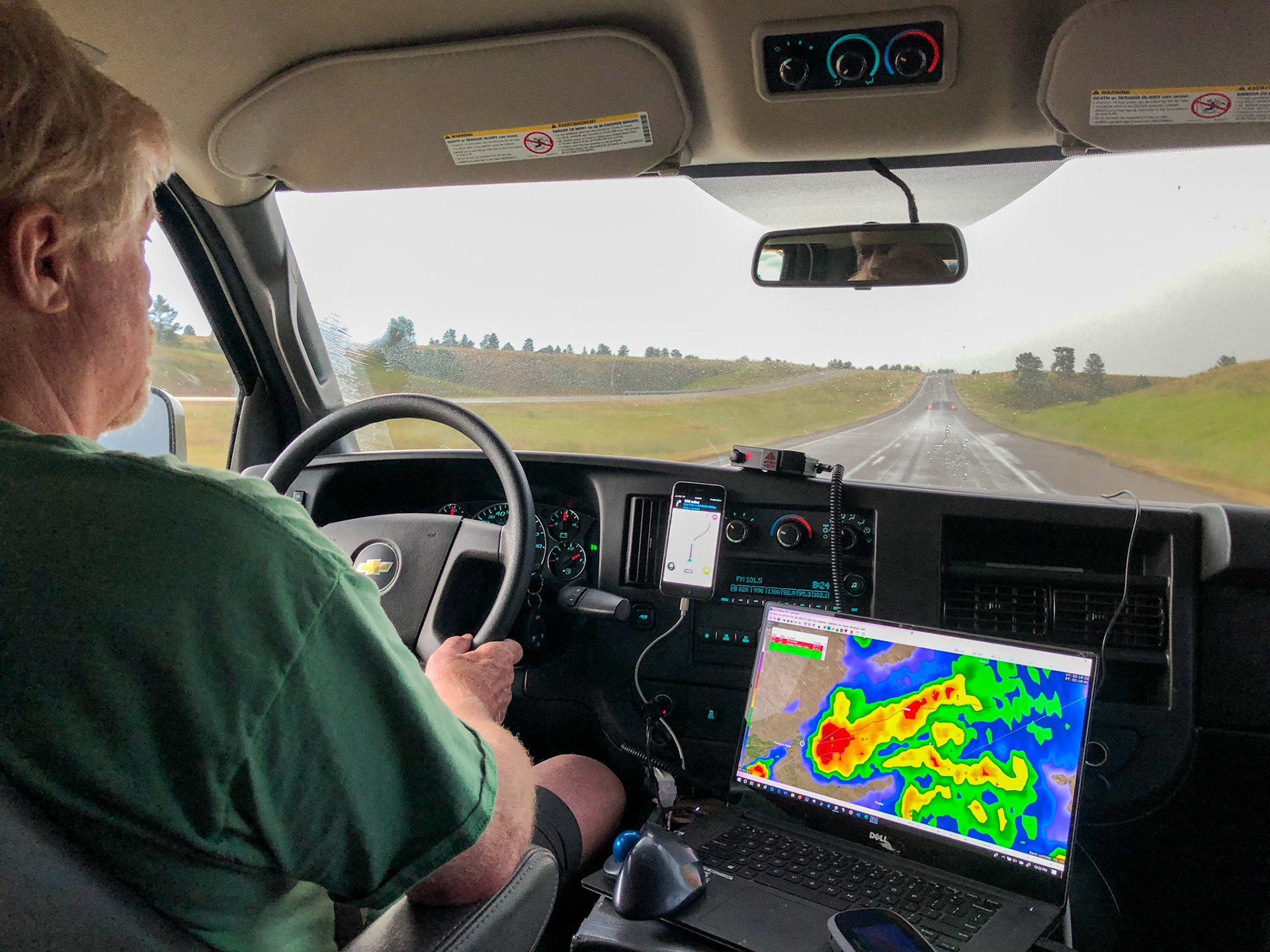 14 Jul: Rusty driving the 2nd van, on I-94 in Montana