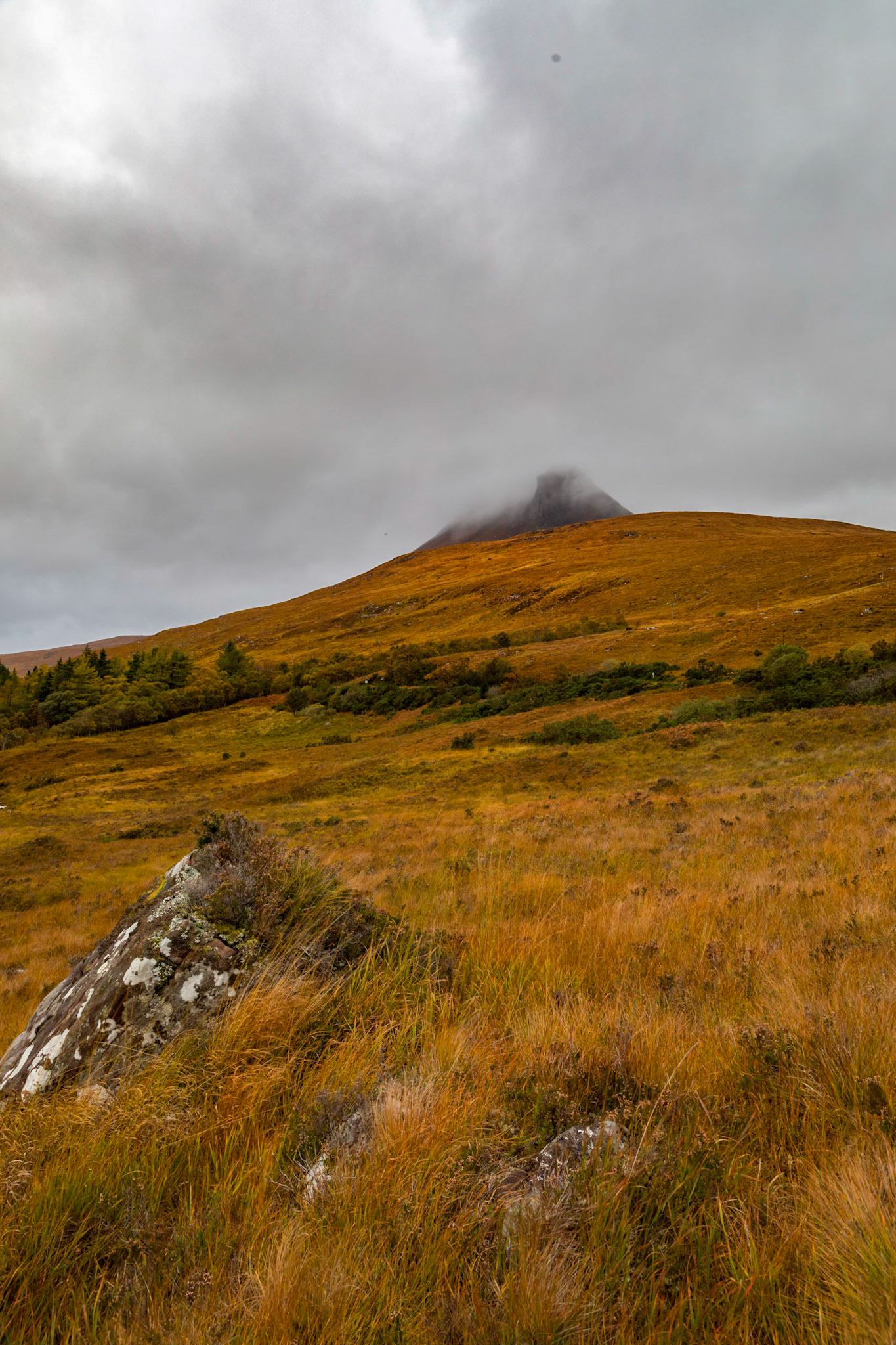 Above Loch Lurgainn, cloud shrouded iconic Stac Pollaidh