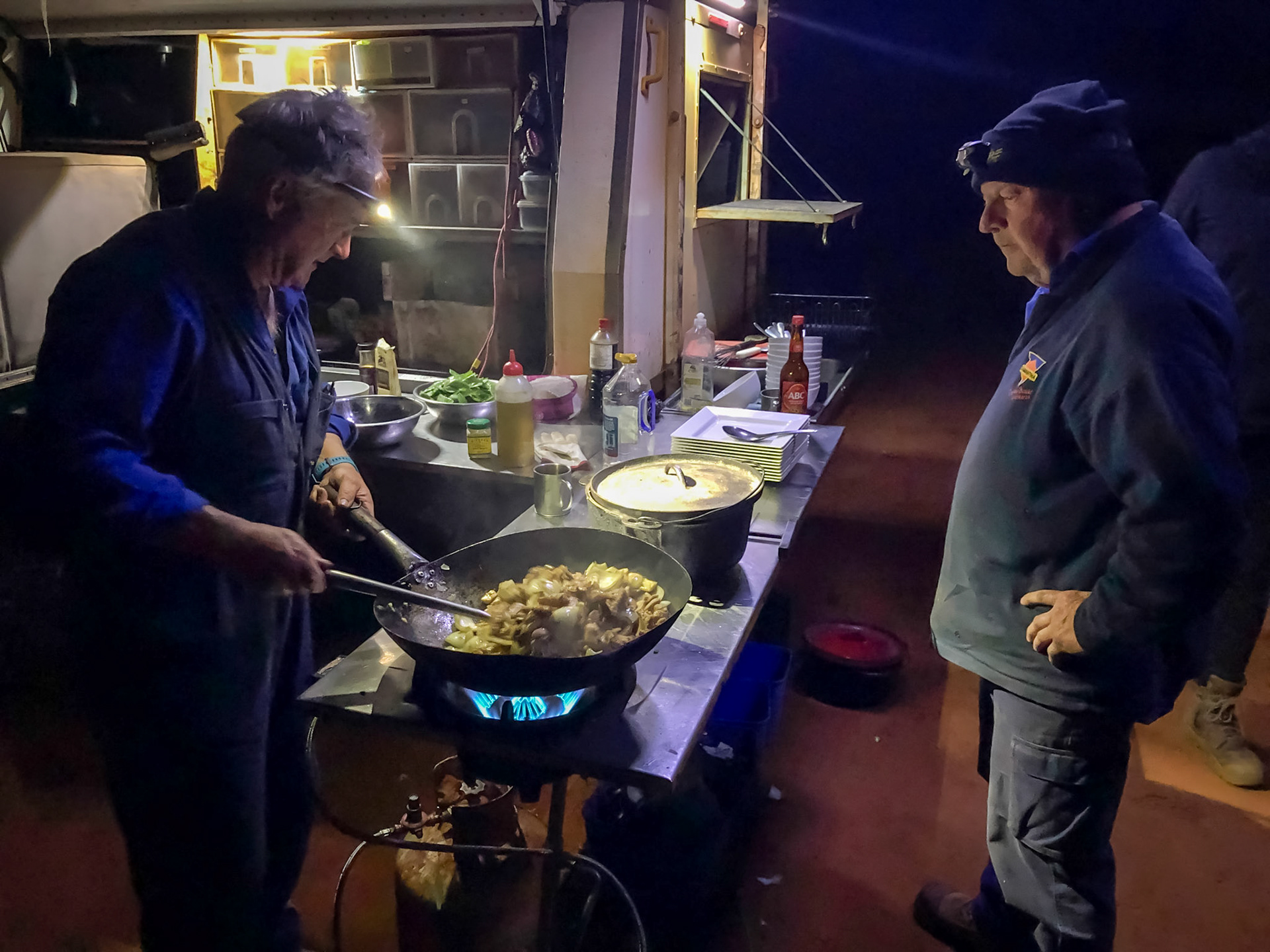 Andrew &amp; Gerry preparing our last camp dinner
