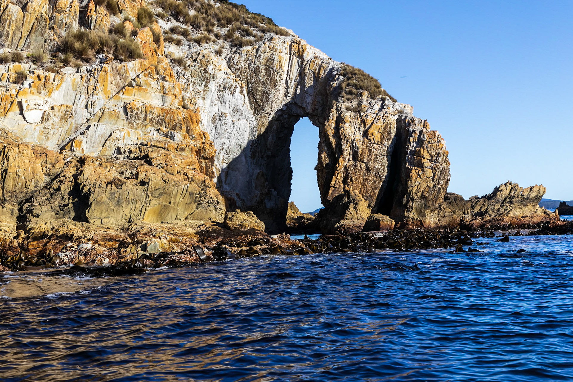 Rock bridge. A cruise along the Breaksea Islands