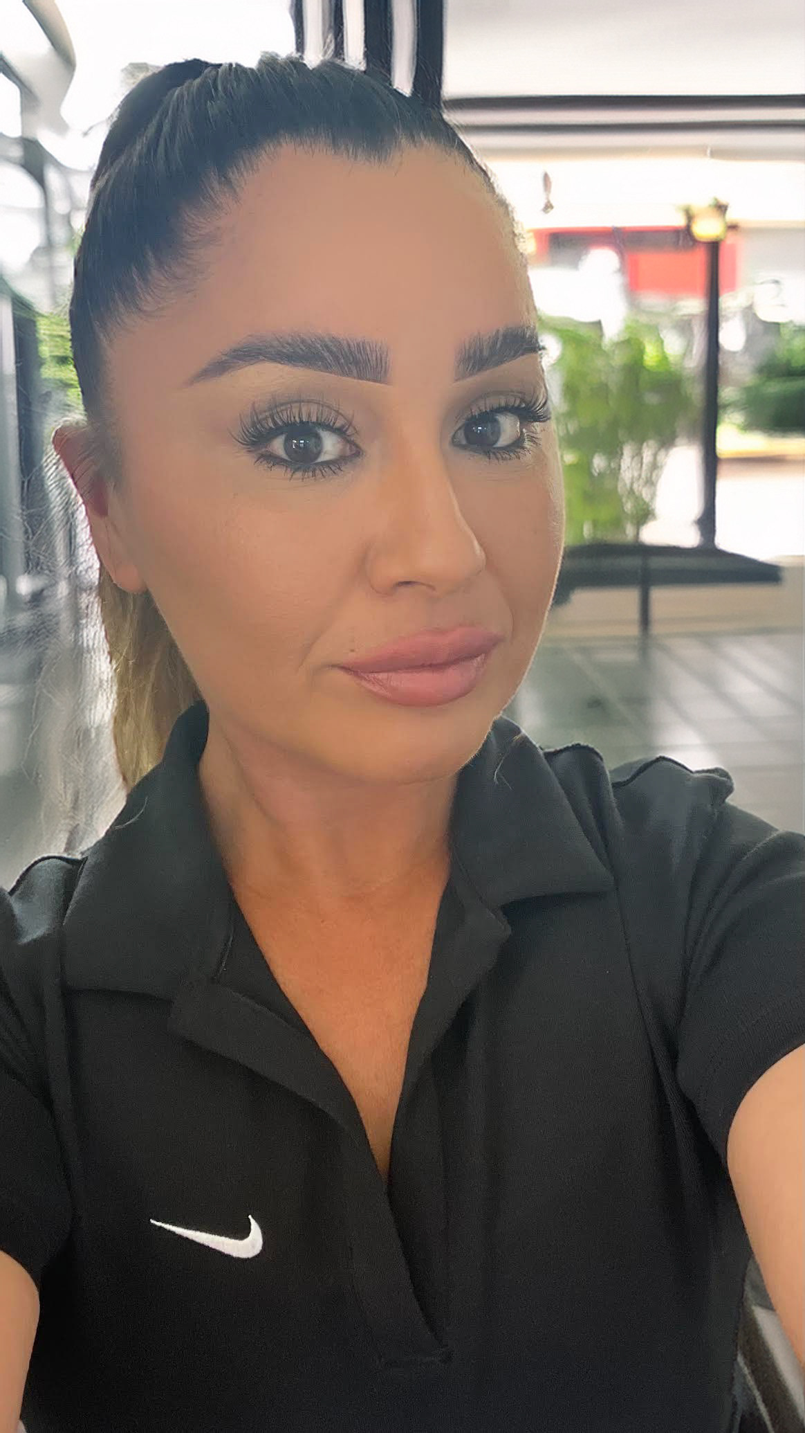 Portrait of a woman edited using Photoshop masks and channel techniques to enhance skin tone, refine highlights, and maintain natural facial features.