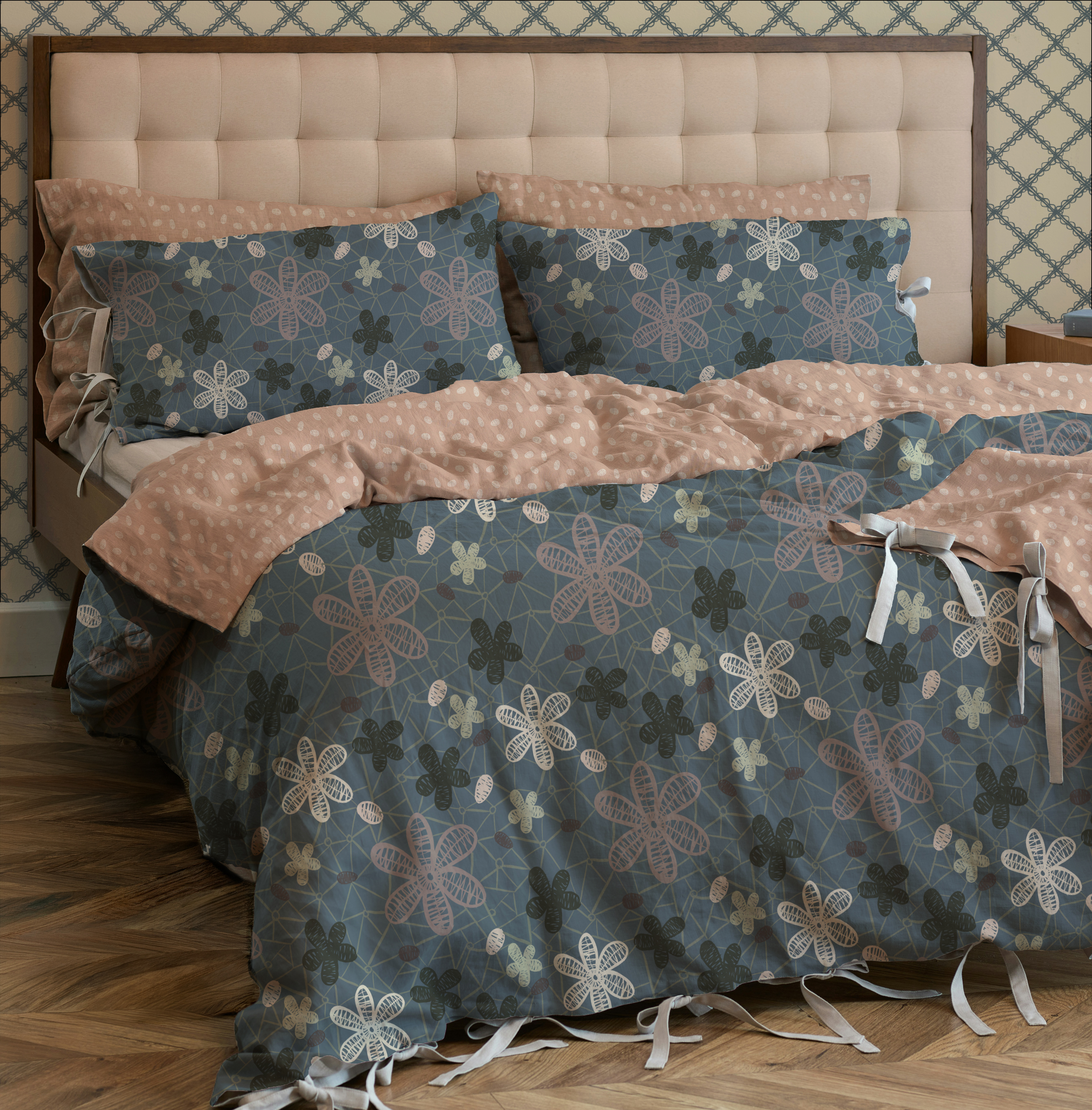 Home decor mockup showcasing the Lacy Flowers collection, with delicate lace‑style florals and soft neutral tones displayed on bedding and textile samples.