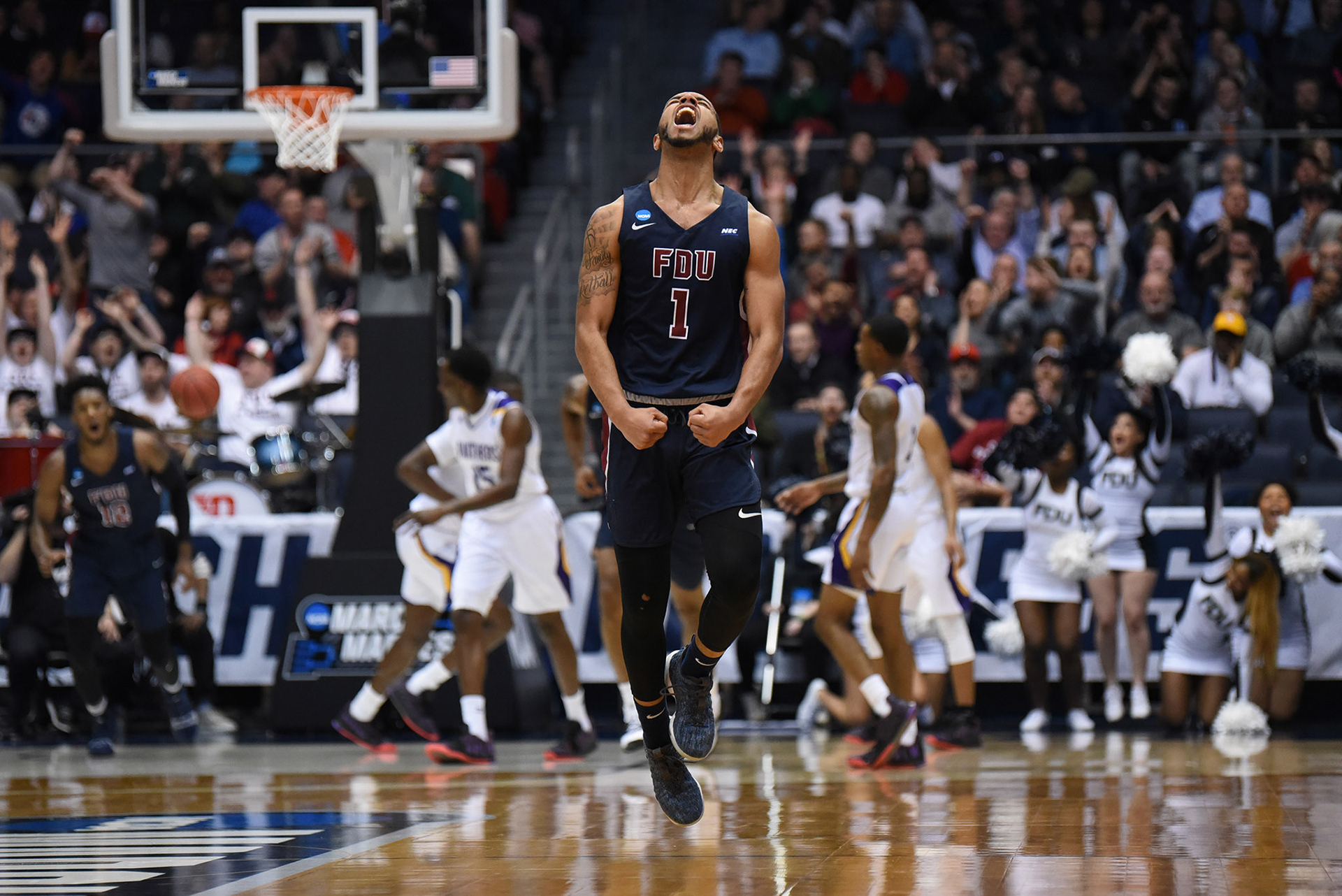 March 19, 2019: Fairleigh Dickinson Knights guard Darnell Edge (1) jumps in joy as he hits a 3 to increase their lead over Prairie View A&M during the NCAA First Four game between the Prairie View A&M Panthers and the Fairleigh Dickinson Knights at the University of Dayton Arena in Dayton, Ohio. Austyn McFadden/CSM