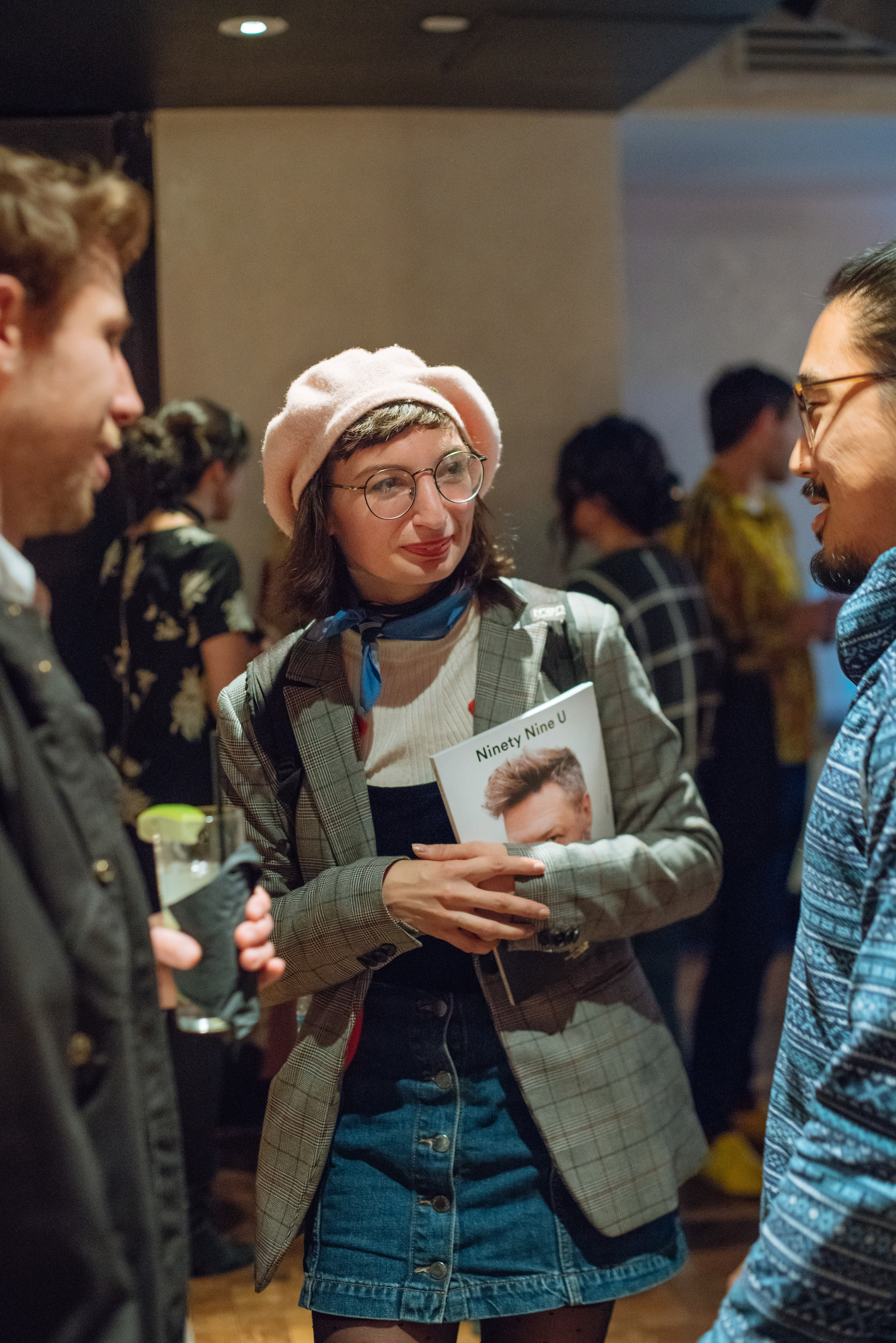 Guests mingle at a 99U salon