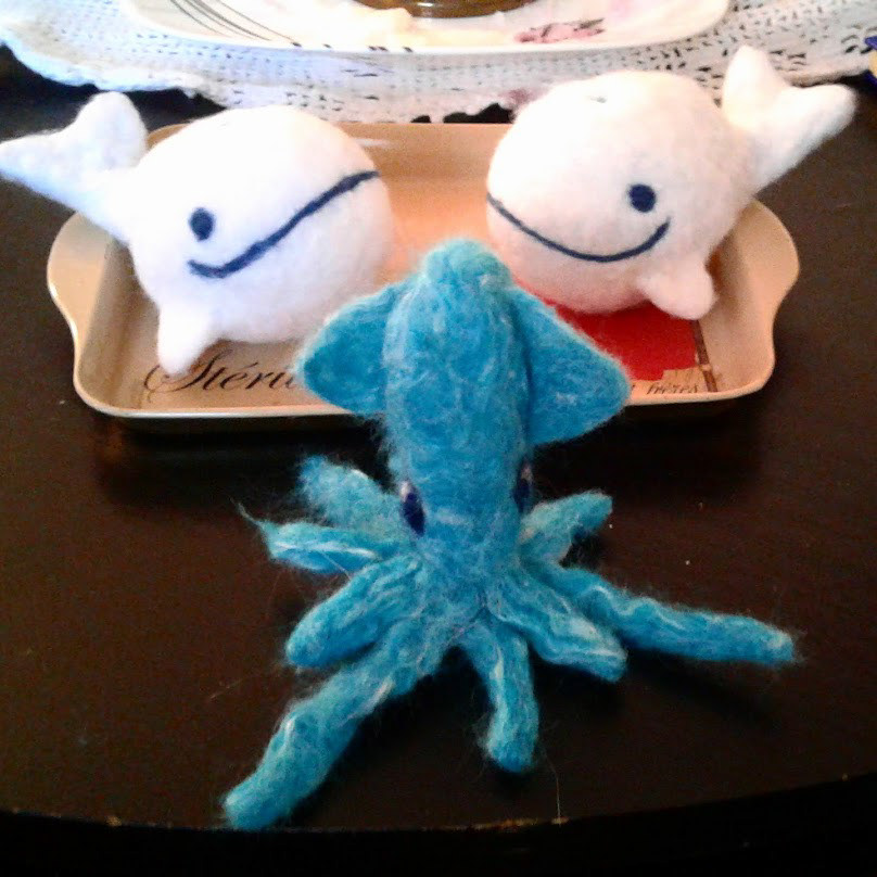 Needle felted whales and squid