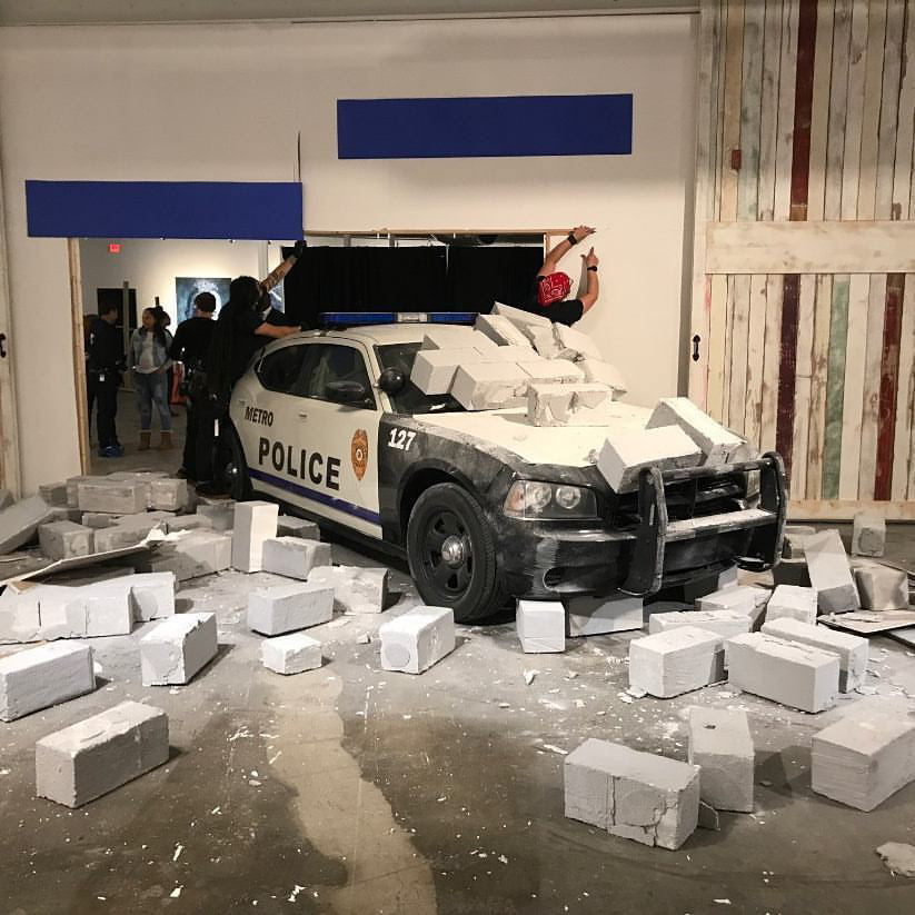 Custom built cinderblock break-away wall made from styrofoam and plaster for feature film