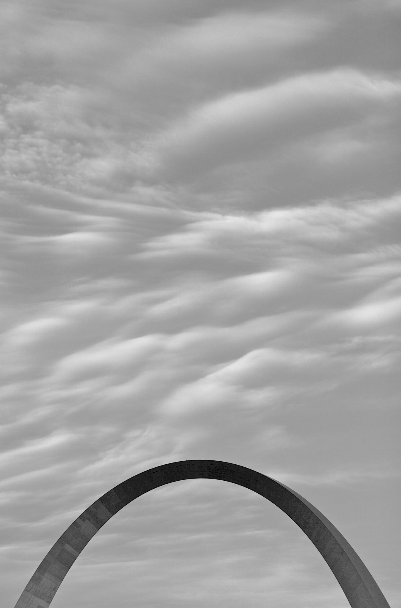 The top of the Gateway Arch with clouds above on September 2, 2006.