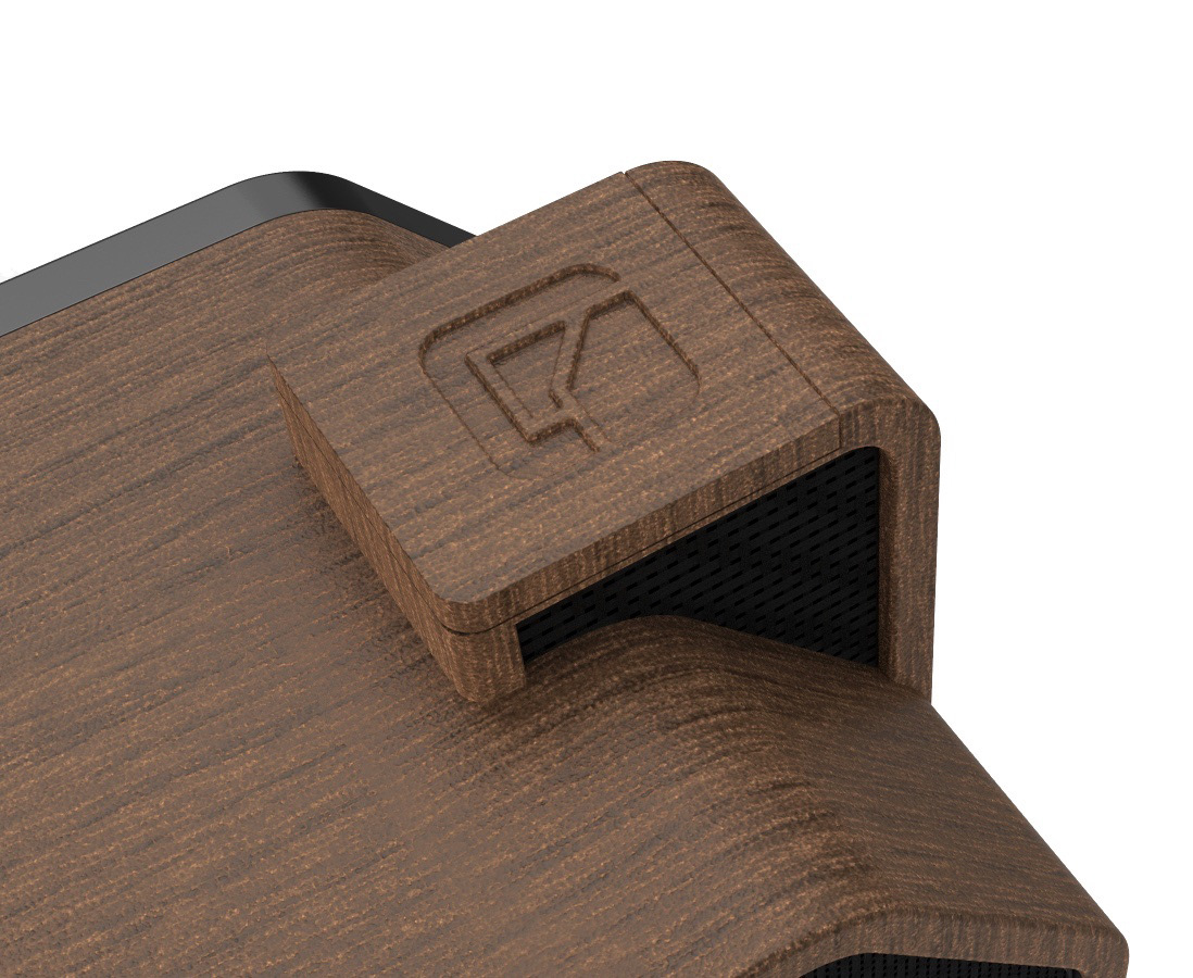 Tactile button activates microphone.