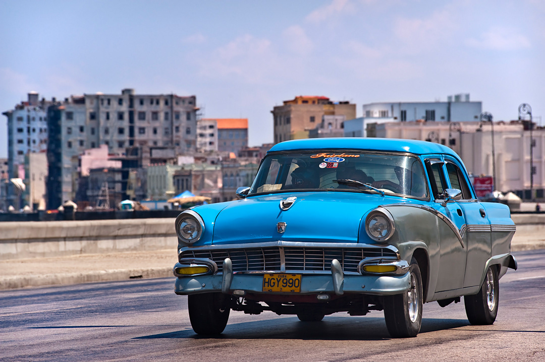 Old car in the Malecon. Economic blockade forces cuban people to use all their habilities to survive. 