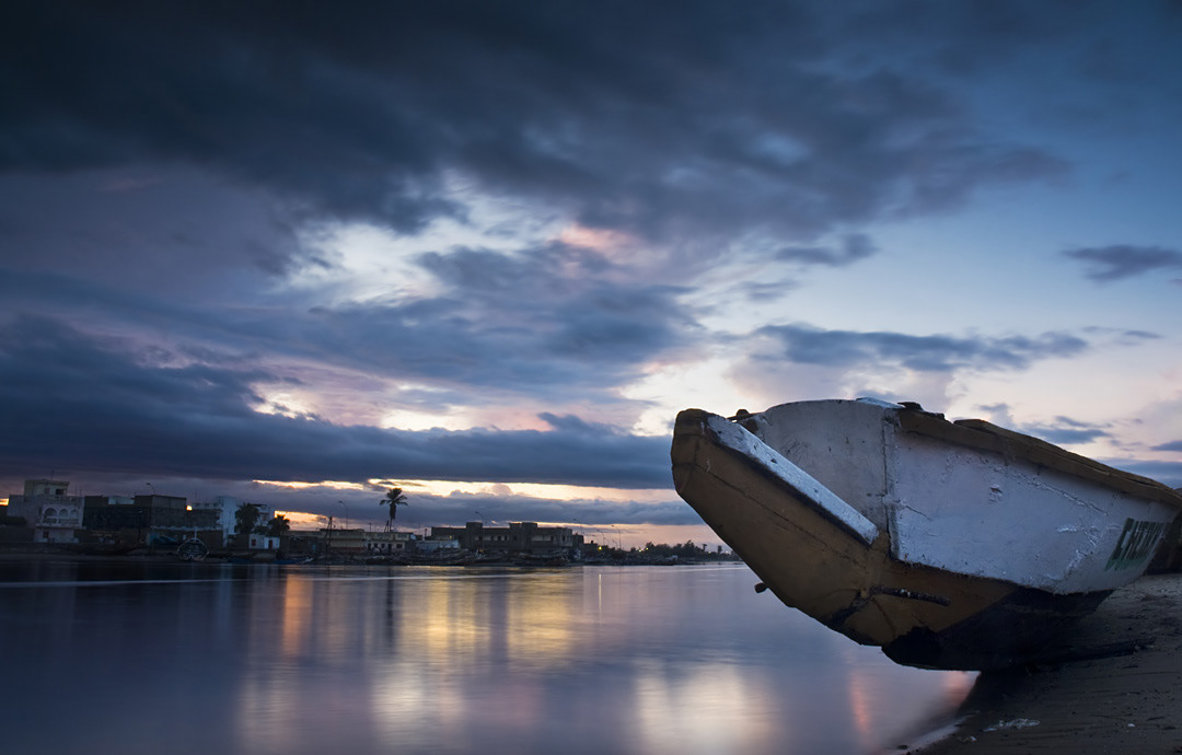 Boat beside Senegal river. 