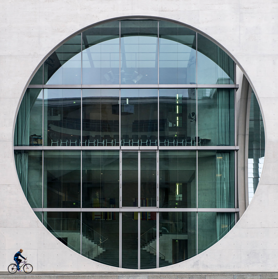 A cyclist beside the new Federal Chancellery in Berlin.