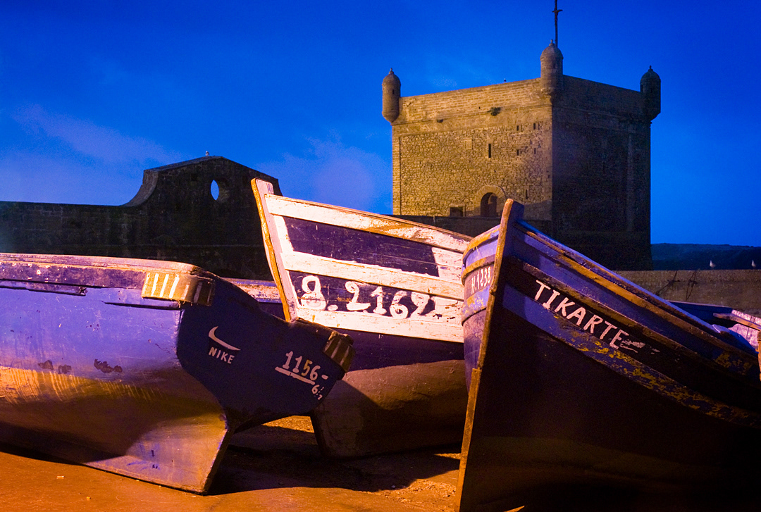 Fishing boats beached in Essaouira Harbour, near the old portuguese castle.