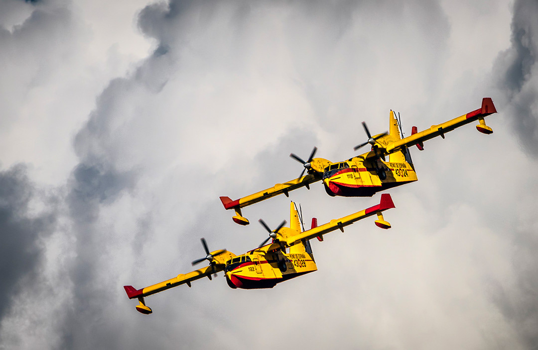 Two Bombardier CL-415T of the 43 Group of the Spanish Air Force in flight.