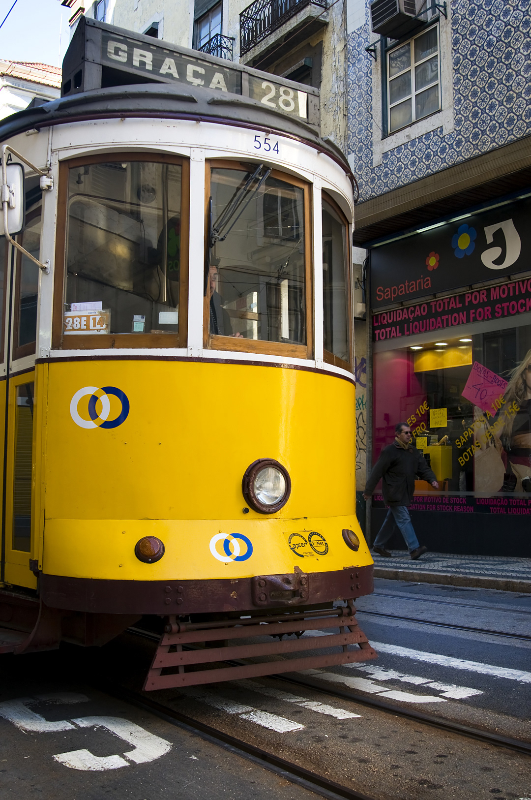 Tram in the streets of Lisbon city centre. 
