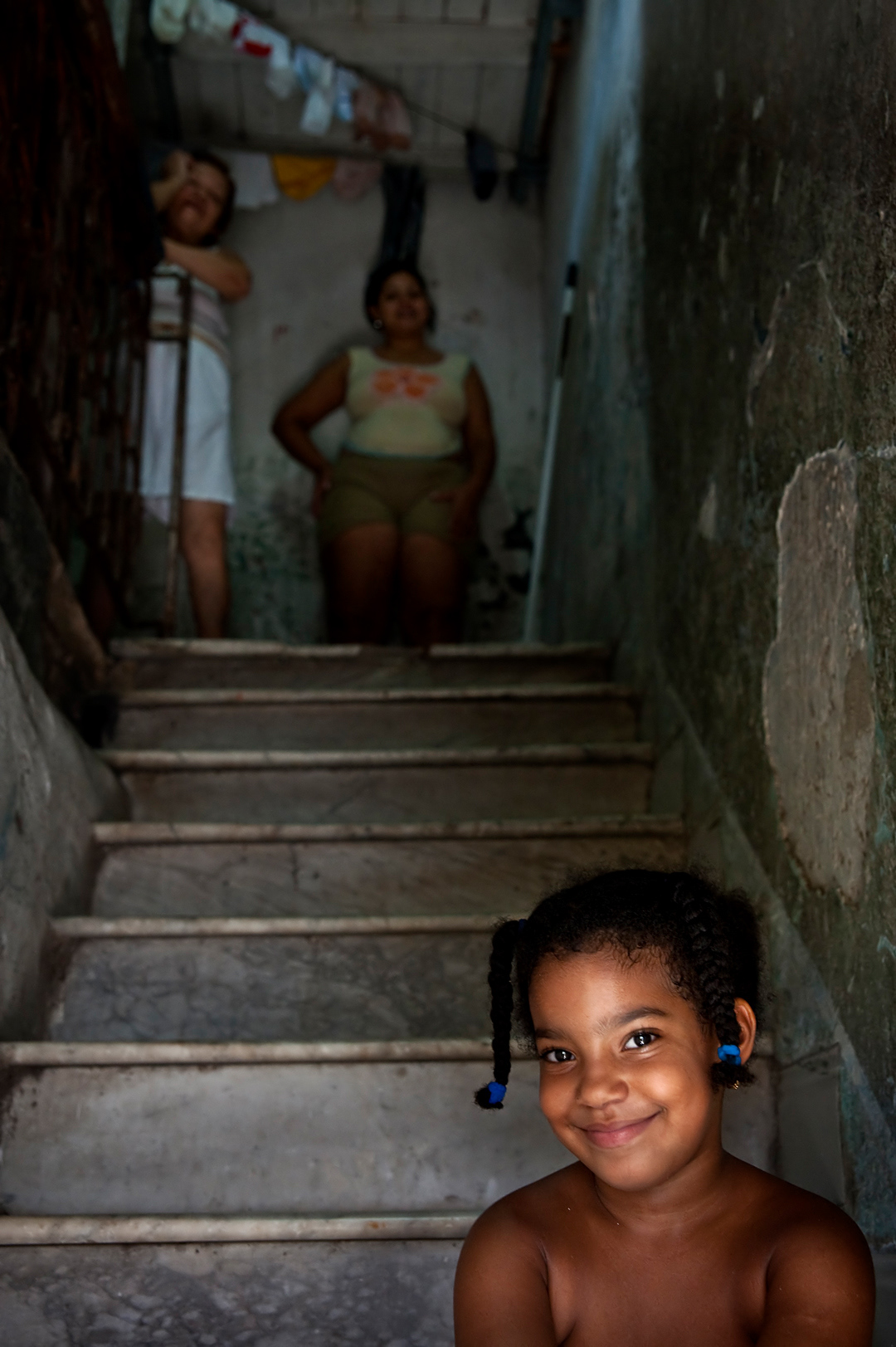 Building in Central Habana. In cities like La Habana the problem with housing forces to some generations of the same family to live together. 