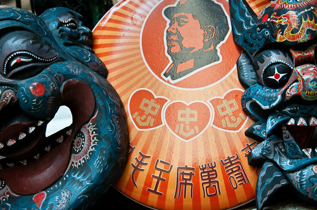 President Mao Zedong souvenir and traditional masks in Cat Street Market. 