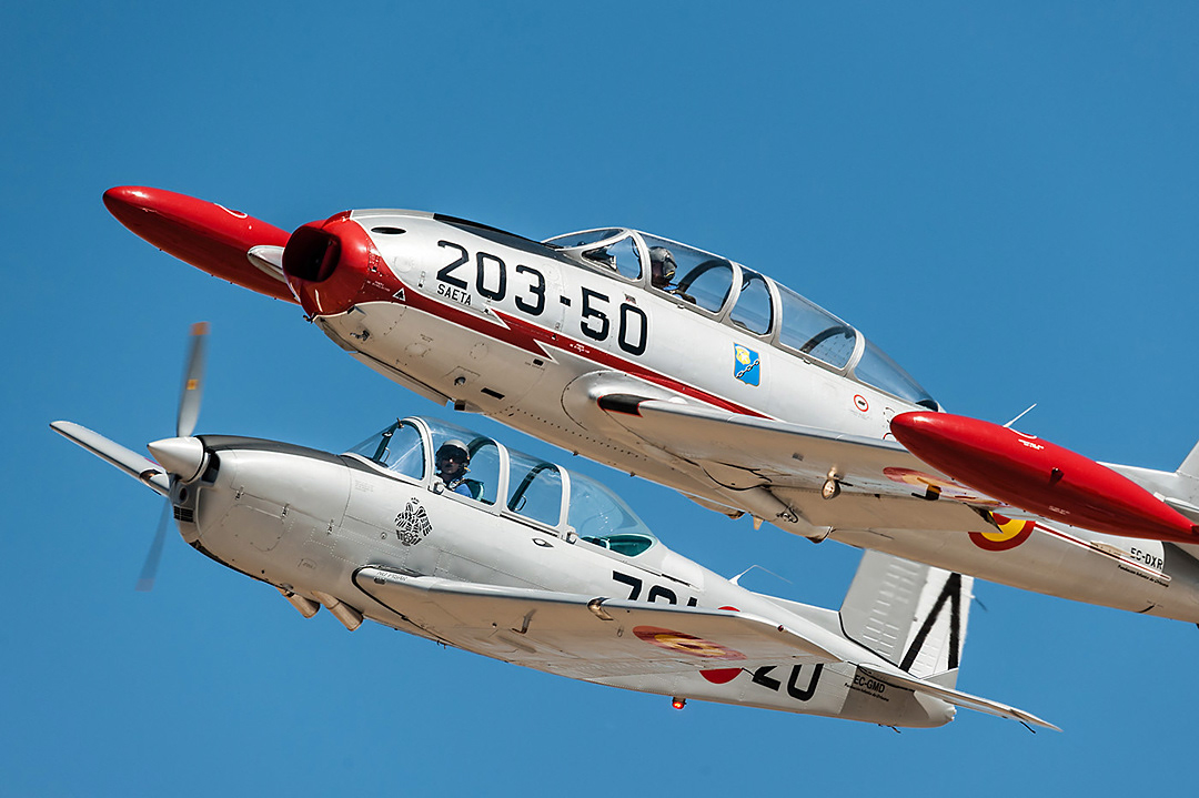 HA-200 Saeta and Beechcraft T34 Mentor of the Fundación Infante de Orleans during an air show at the Cuatro Vientos airfield in September 2012.
