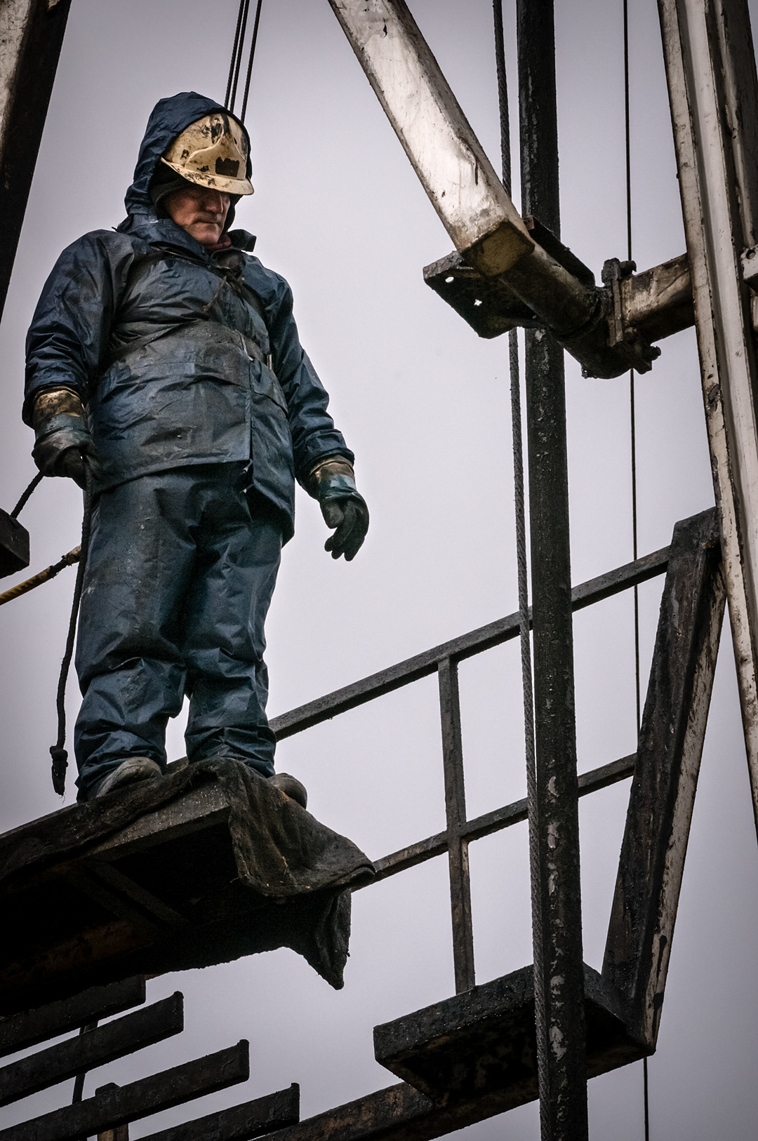 Worker in a Petrol station near Sargentes de La Lora (Burgos, Spain) 