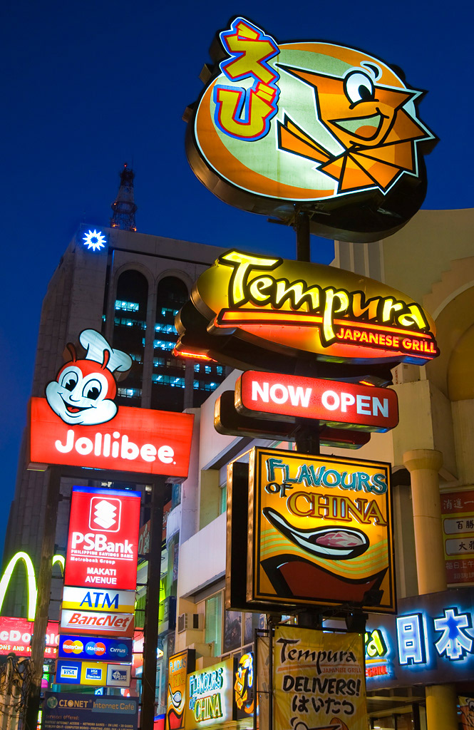 Neon signs in Makati Avenue (Manila).